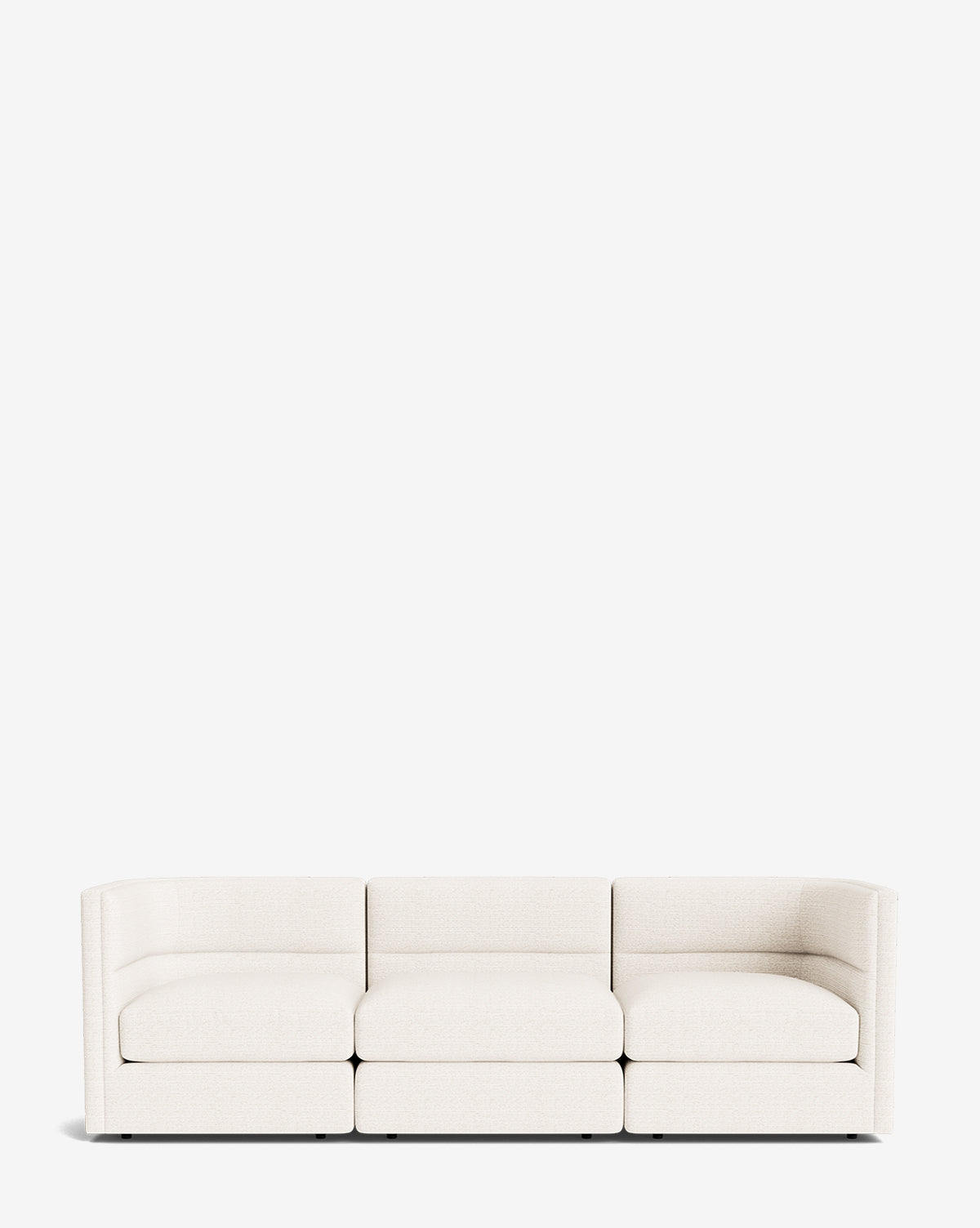 The Makerspalm Claremont Modular Sofa 99 is a modern, three-seat design in white with curved arms and a low back, shown against a plain white background. McGee & Co.