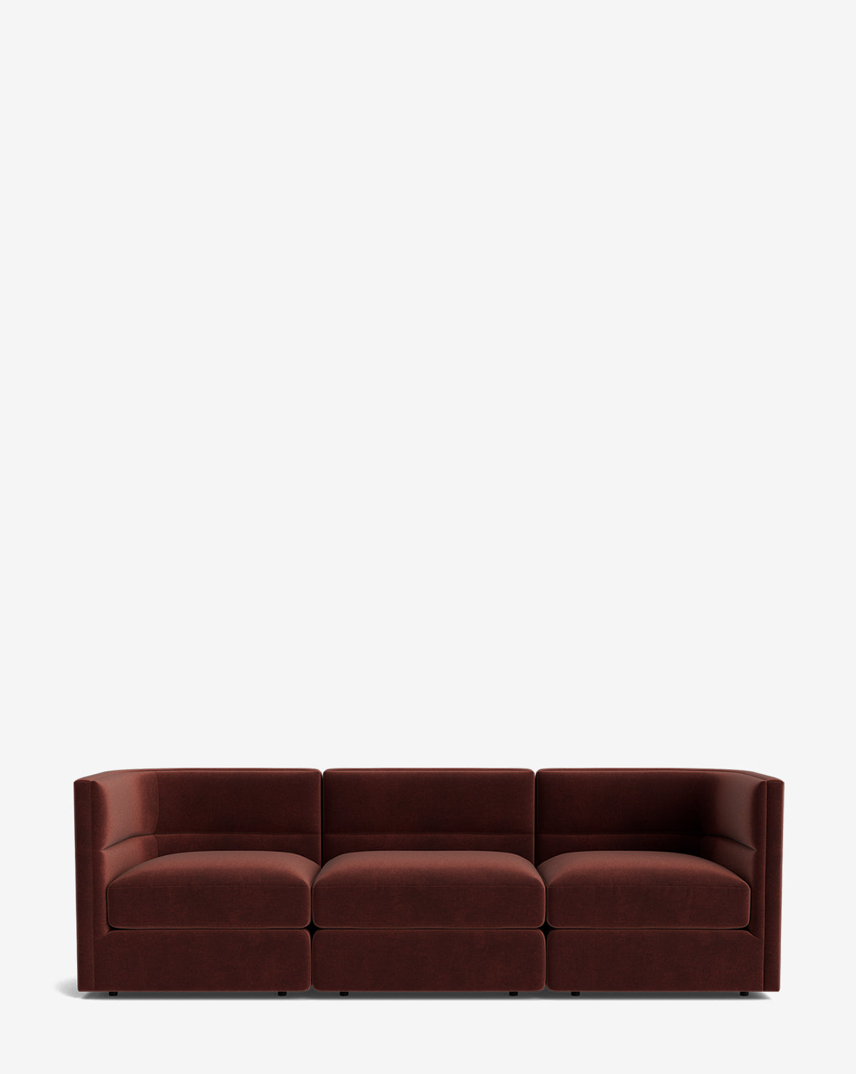 The Claremont Modular Sofa 99 features deep burgundy upholstery with low, blocky arms and backrests for luxurious comfort, shown against a plain white background, by McGee & Co.