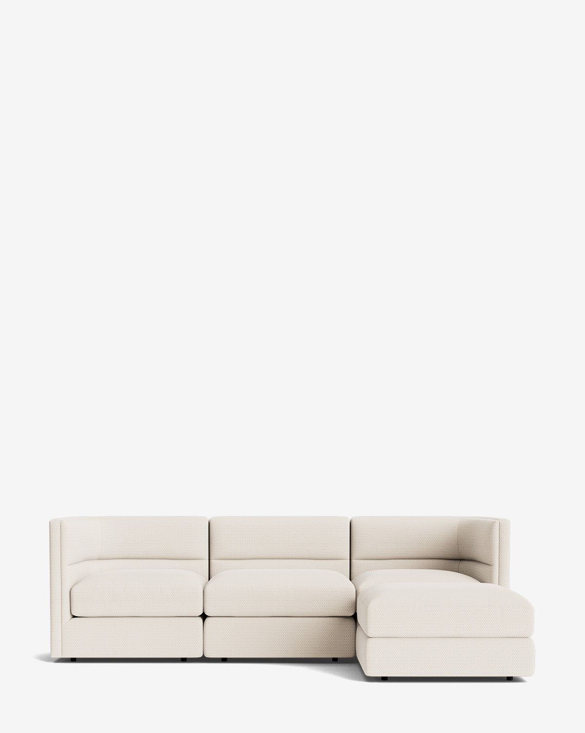 The Makerspalm Claremont Modular Sofa with Ottoman 99 is a modern, light beige three-seater featuring a right-side chaise lounge, shown against a plain white background. McGee & Co.
