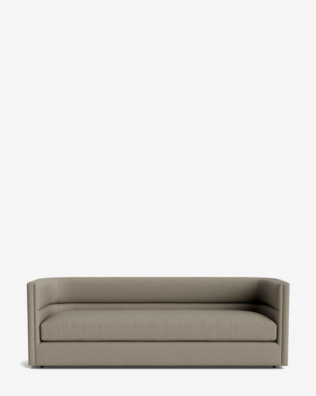 The Claremont Sofa 84 features a modern, minimalist design with straight arms and a low backrest, upholstered in high-quality light gray fabric, displayed against a plain white background by McGee & Co.