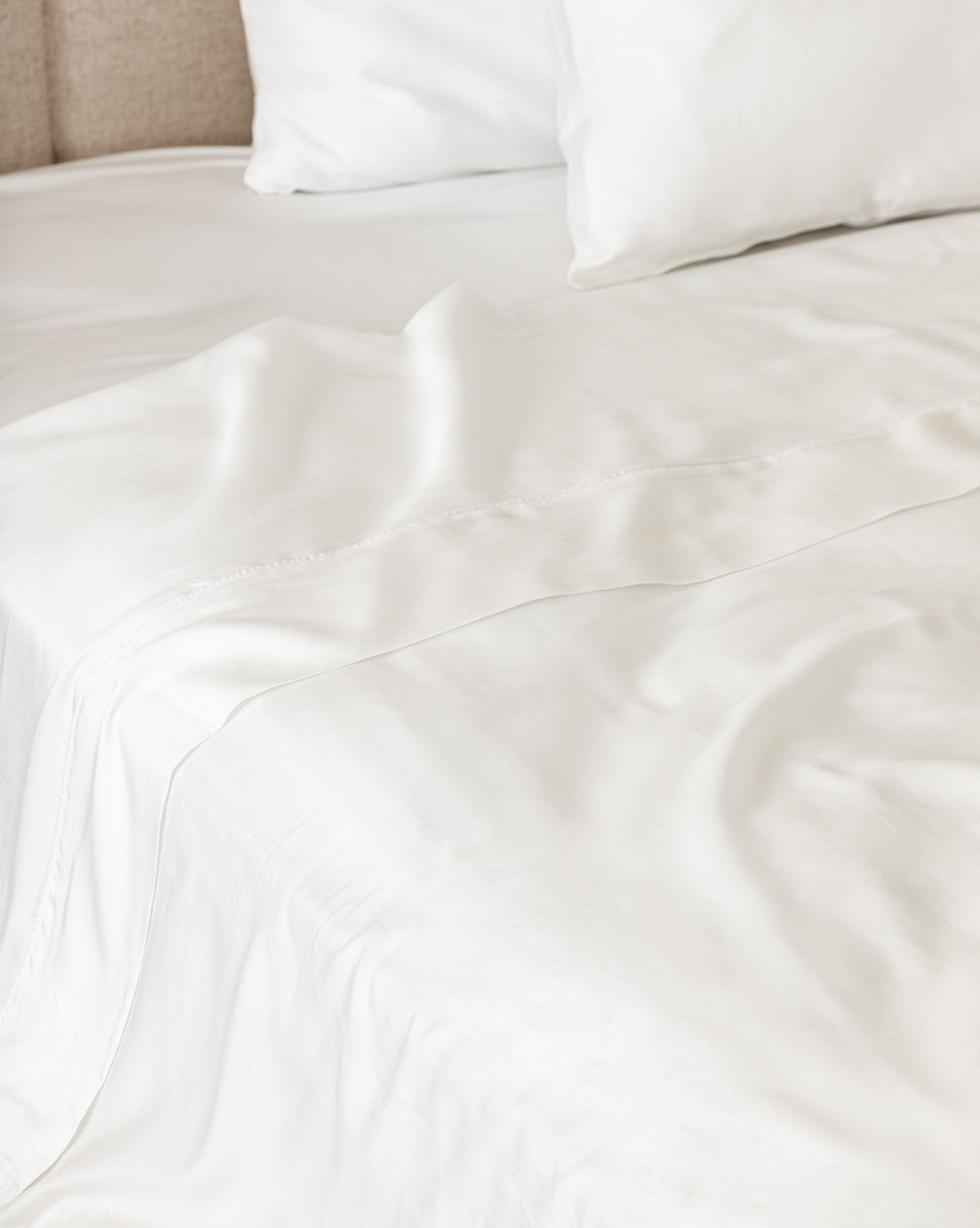 Twin Claussen Tencel Sheet Set folded to show smooth, luxurious texture from McGee & Co.