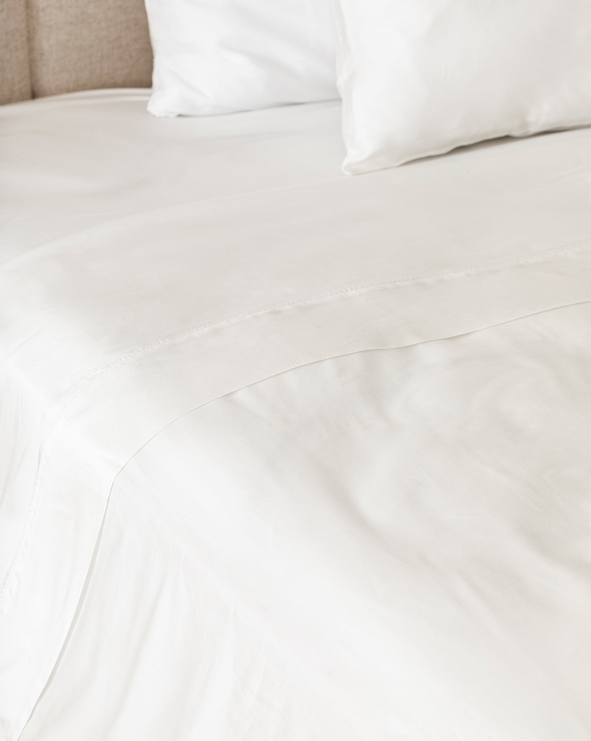 Claussen Tencel Sheet Set styled with neutral bedding for a serene look from McGee & Co.