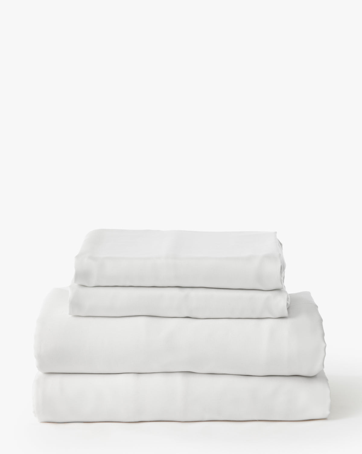 King size Claussen Tencel Sheet Set in soft sateen finish styled on a bed from McGee & Co.