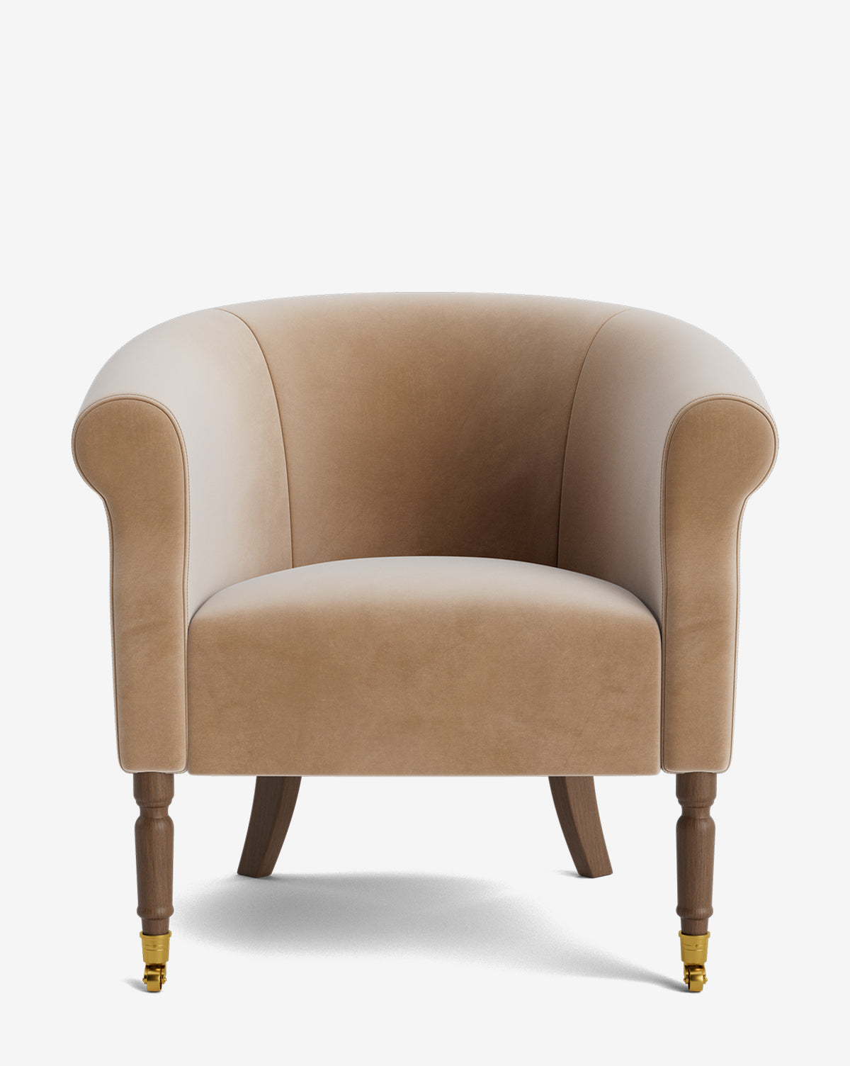 Front view of the Clemence Lounge Chair, upholstered in tan velvet designer fabric, featuring a curved backrest, wooden legs with gold castor wheels at the front, and slightly splayed rear legs by McGee & Co.