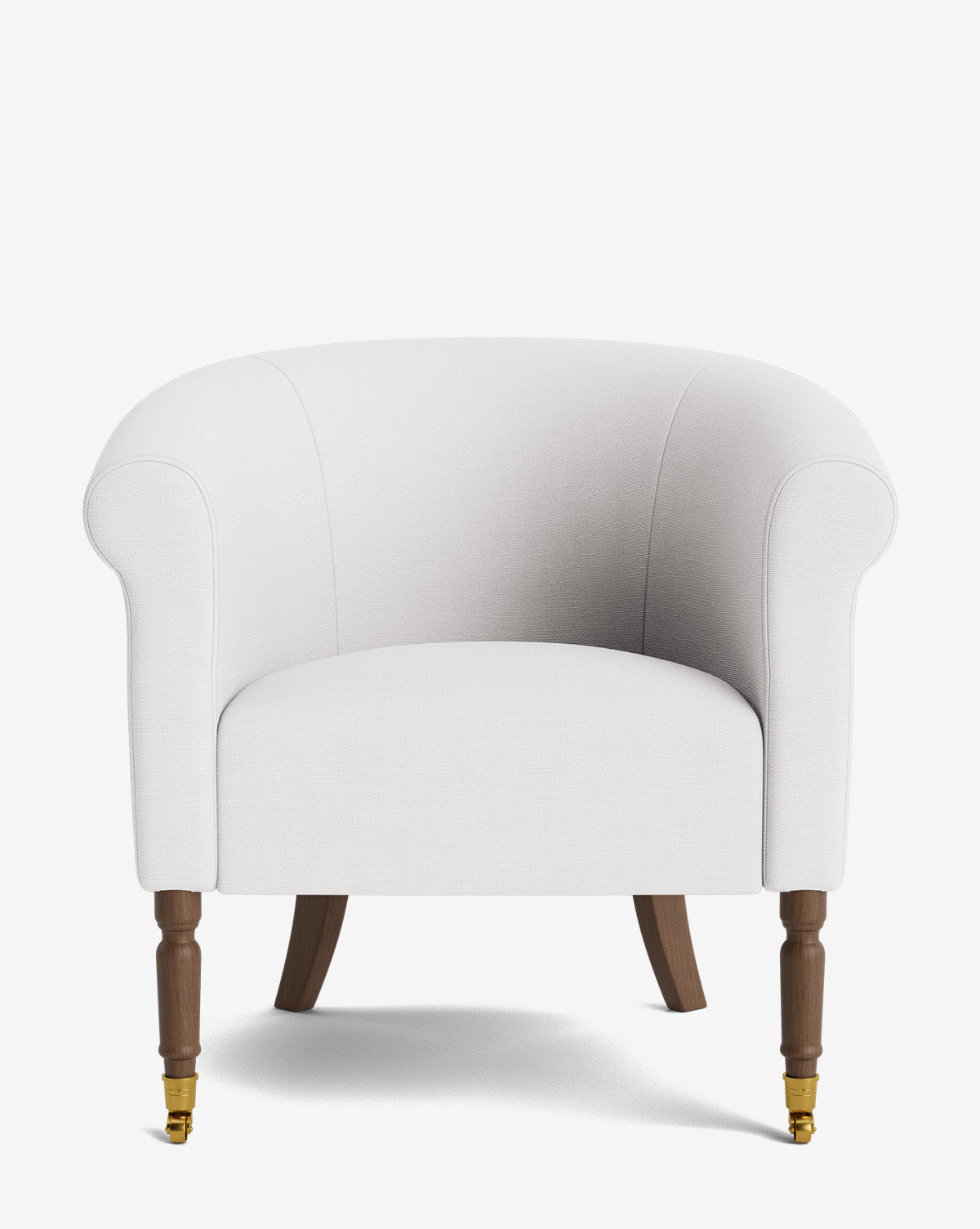 The Clemence Lounge Chair showcases white designer fabric upholstery, curved armrests, wooden legs, and front brass caster wheels, all set against a plain white background by McGee & Co.