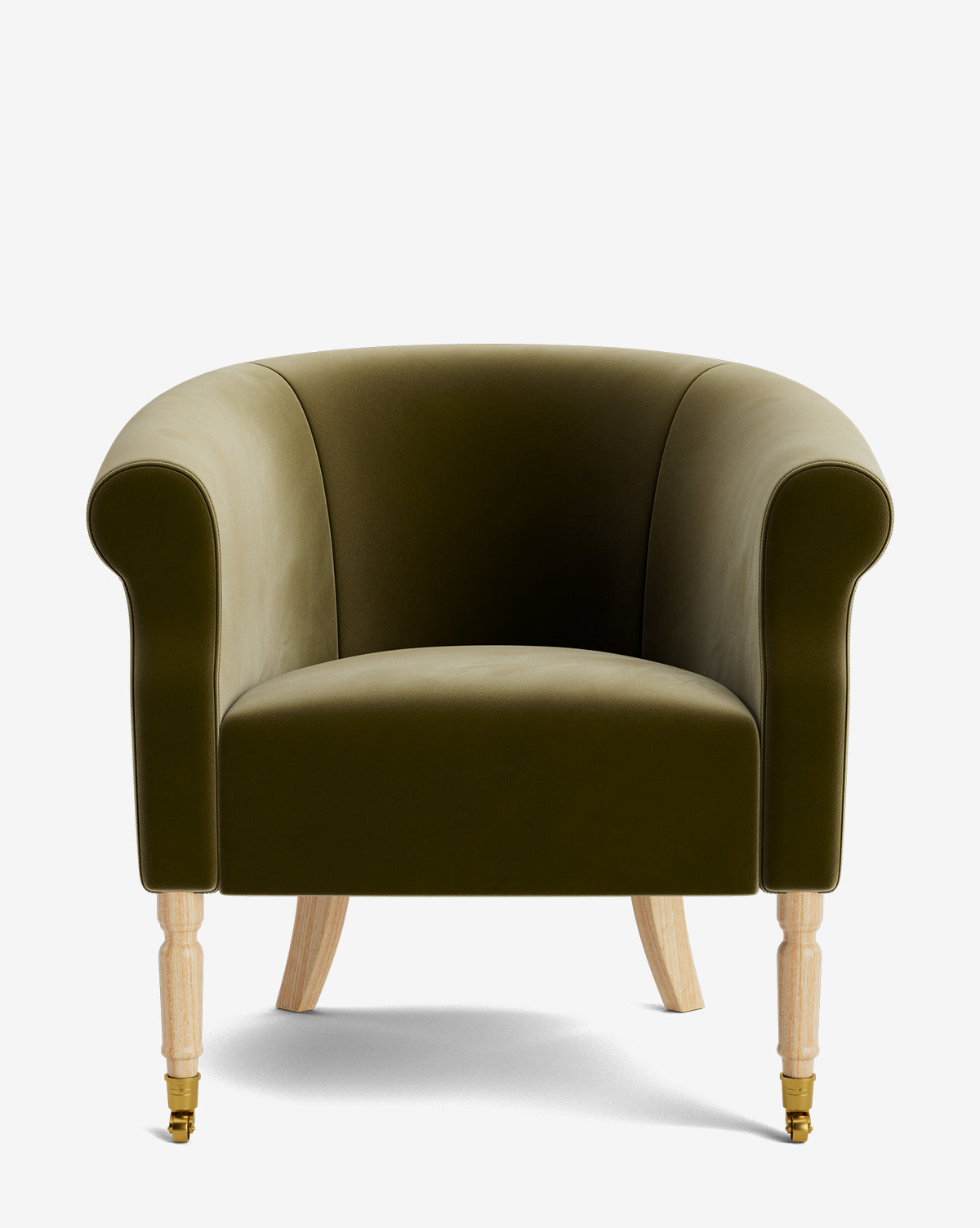 The Clemence Lounge Chair features olive green velvet upholstery, a curved backrest and armrests, light wooden legs with brass castor front wheels, standing out as a classic living room piece against a plain white background by McGee & Co.