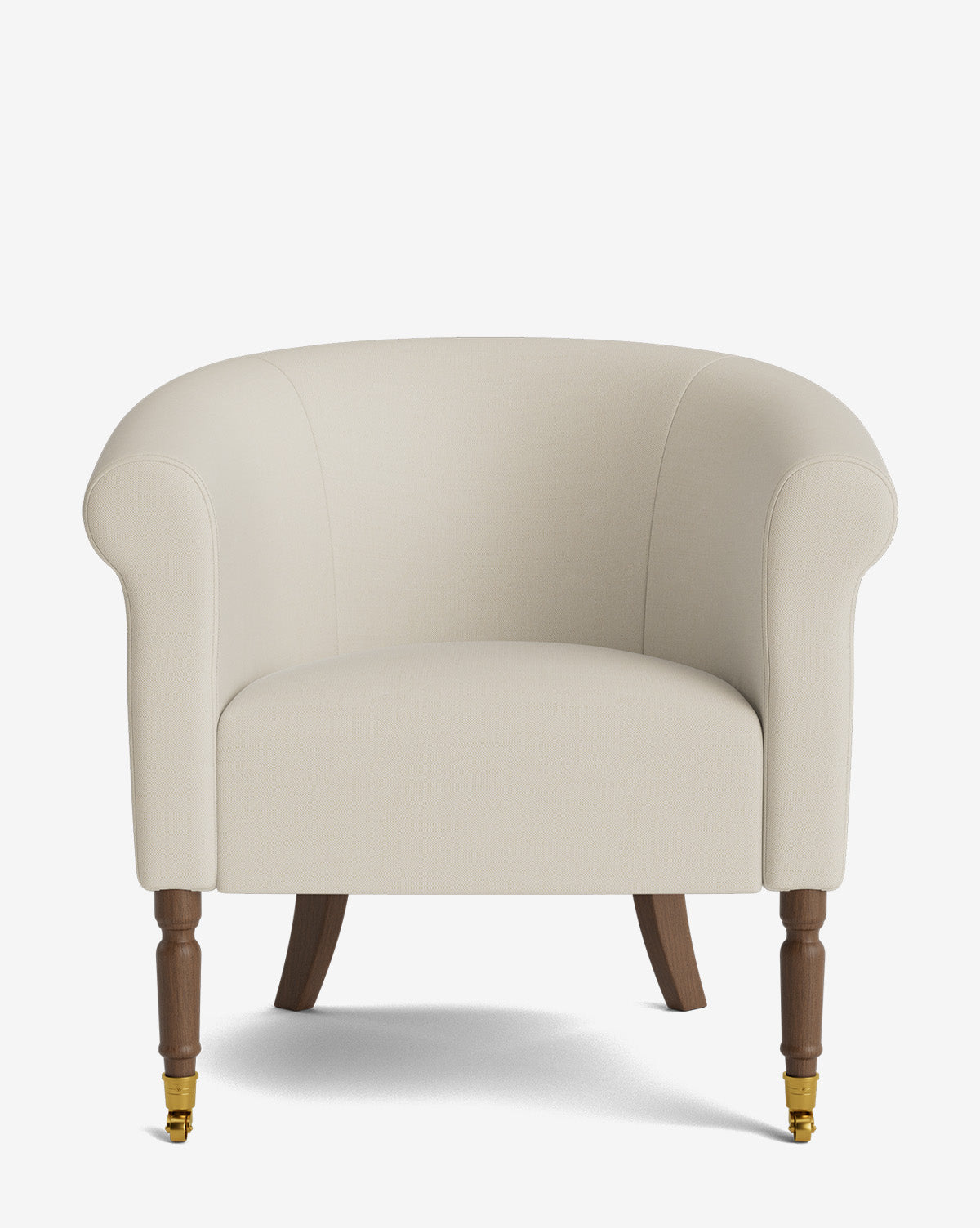 The Clemence Lounge Chair features beige designer upholstery, a rounded back and arms, dark wooden legs, and gold front caster wheels, all set against a white background by McGee & Co.