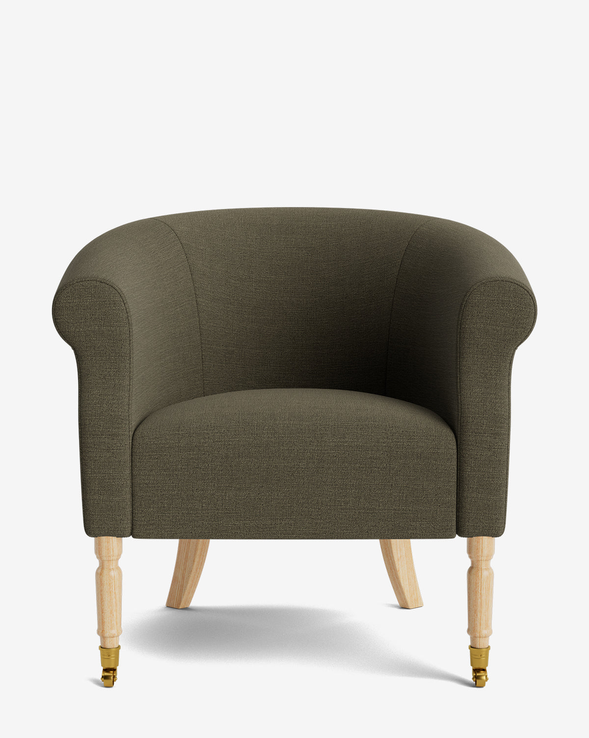 The Clemence Lounge Chair features dark olive green designer fabric, rounded arms, light wood front legs with brass castors, slightly curved back legs—all set against a plain white background by McGee & Co.