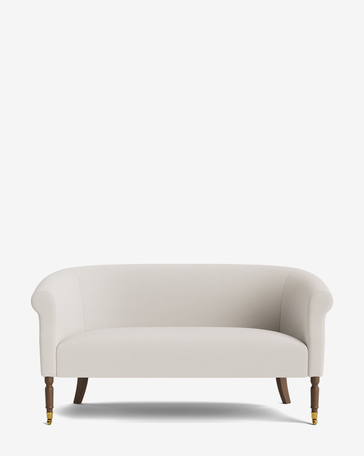 The Clemence Settee 60 features cream-toned designer upholstery, curved arms, wooden front legs with brass casters, and plain back legs—an elegant addition to any space. Shown here against a white background, by McGee & Co.
