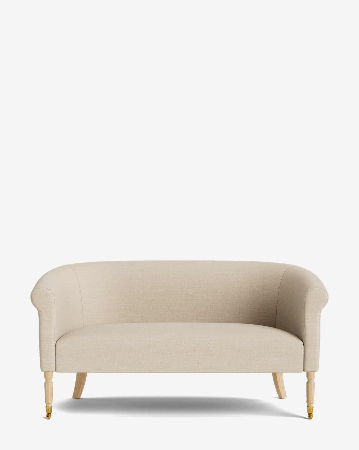The Clemence Settee 60 by Makerspalm features beige upholstery, curved armrests, a rounded back, and light wooden legs—two front legs with brass castors. Its simple, modern style enhances any space and is shown against a plain white background. McGee & Co.