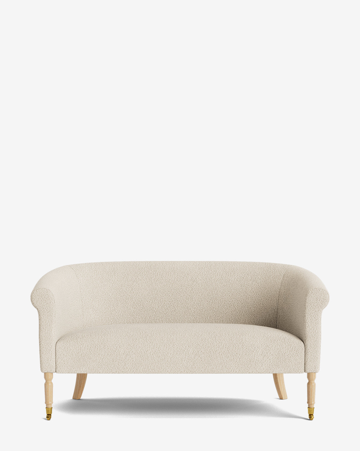 The Clemence Settee 60 features a cream-colored designer fabric, curved arms, and light wooden legs, shown against a plain white background by McGee & Co.