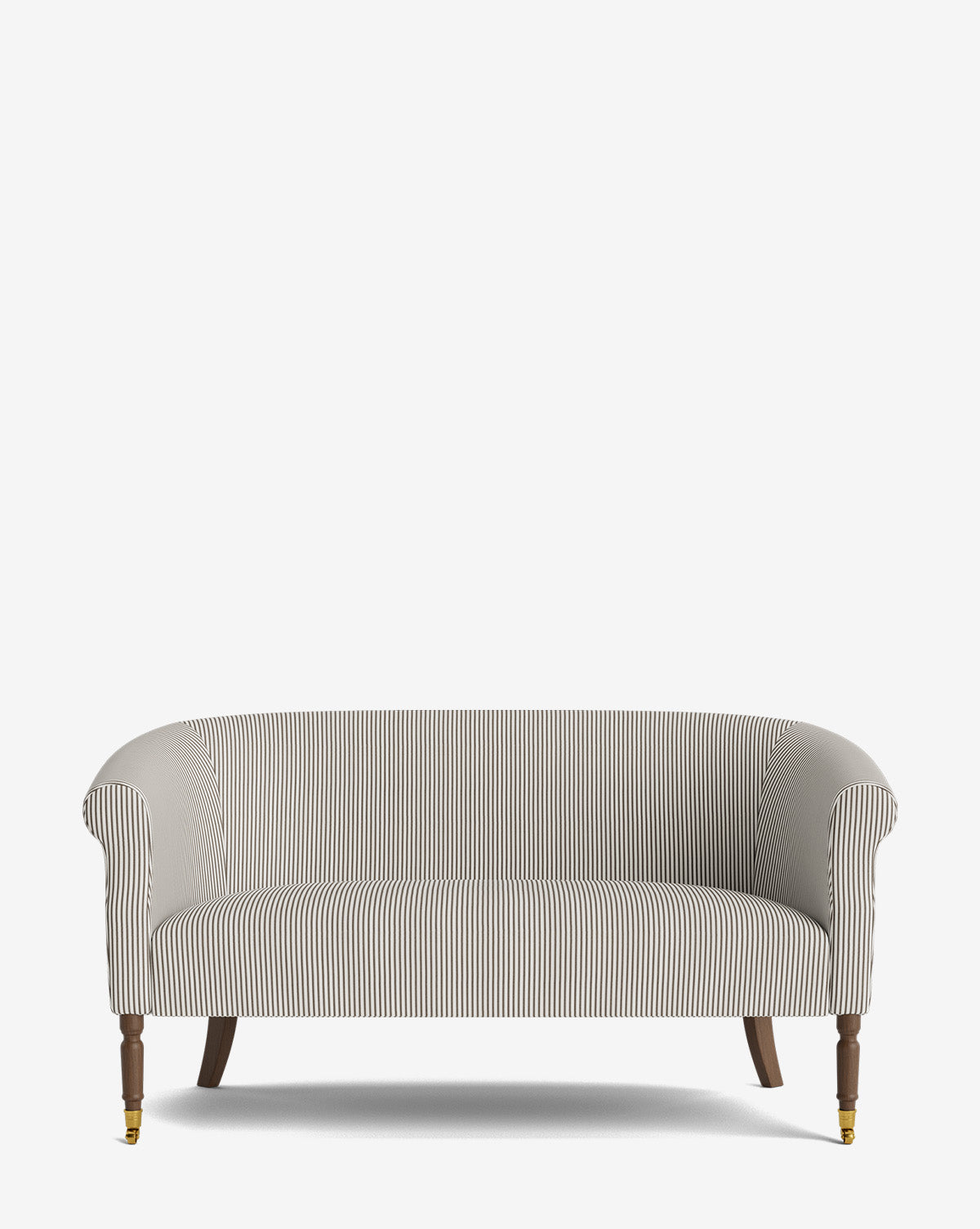 The Clemence Settee 60 features striped designer fabric, curved armrests, and wooden legs—two with brass caster wheels—for added charm. Its elegant look makes it a stunning centerpiece against any plain white background, by McGee & Co.