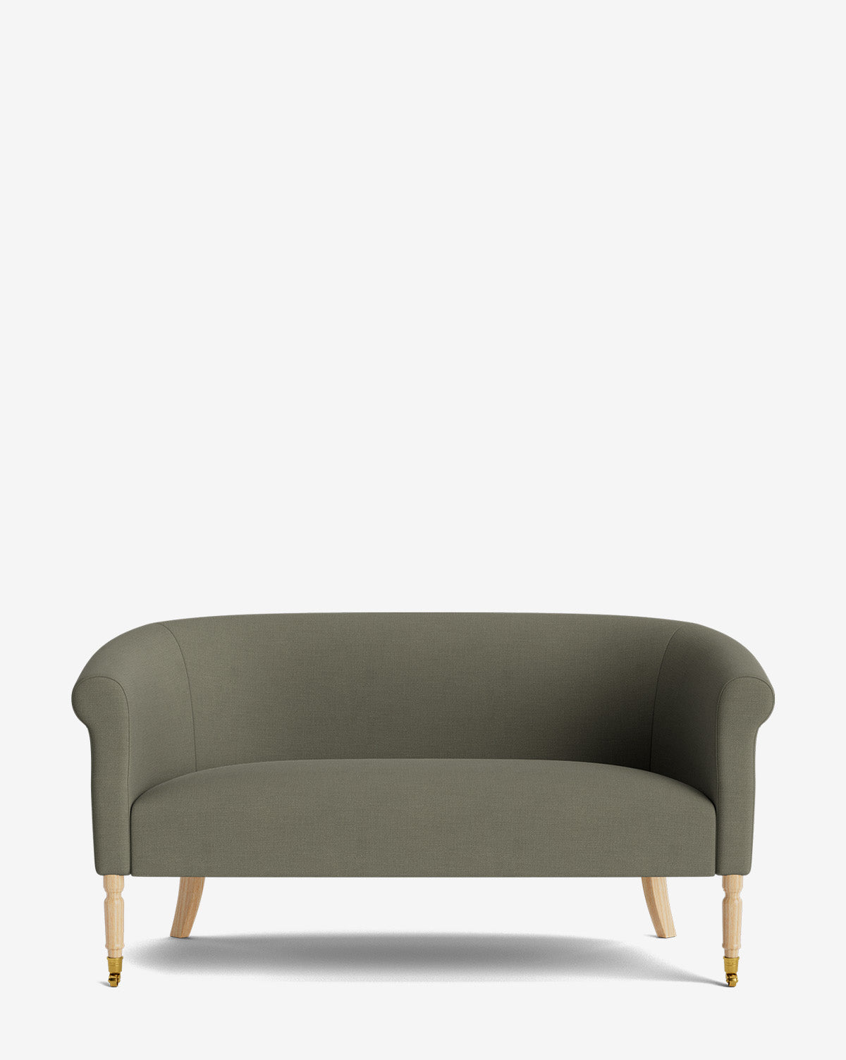 The Clemence Settee 60 features modern olive-green upholstery, rounded arms, light wooden legs (left front leg with brass caster), and is shown against a plain white background—ideal for bringing designer style to your living space, by McGee & Co.