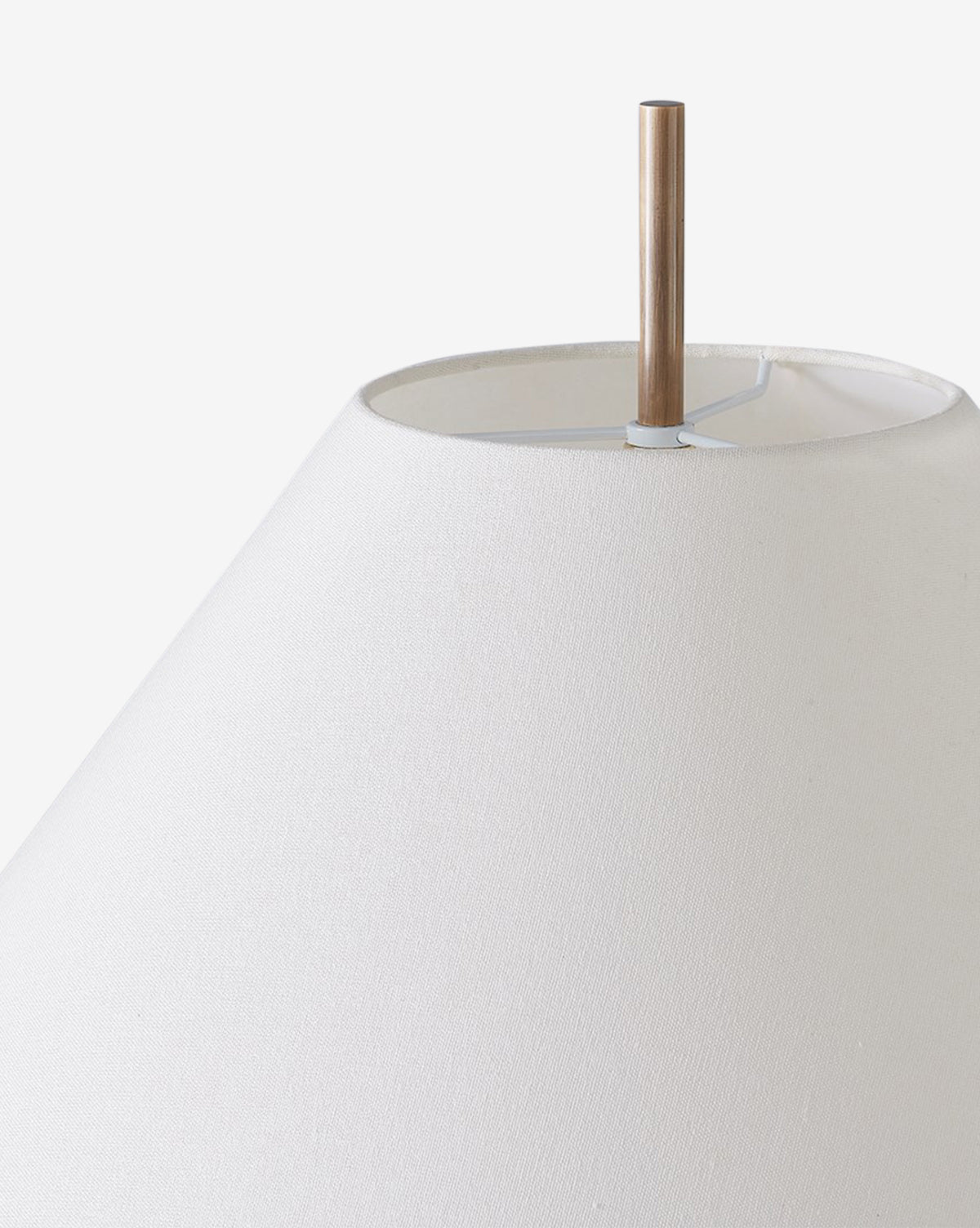 Close-up of the Clic Floor Lamp’s top, highlighting its off-white linen shade and central metal rod, shown against a plain white background, by McGee & Co.