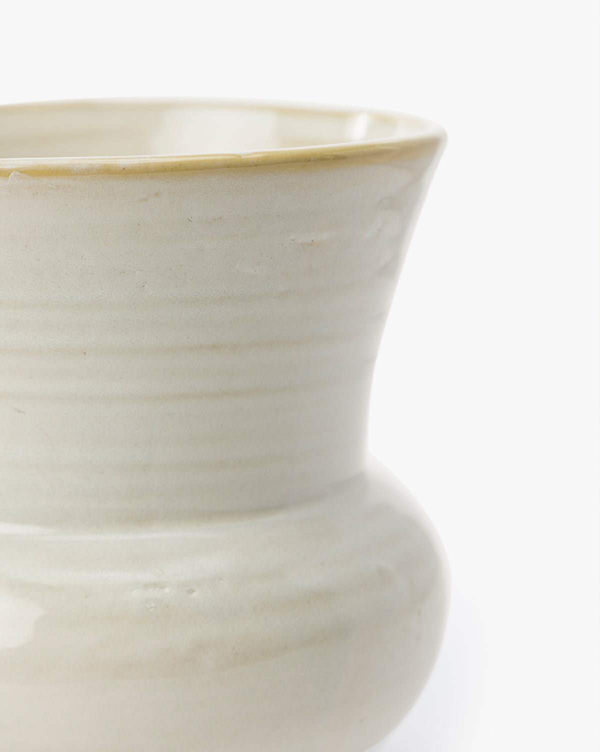 Close-up of the Colchester Planter, showcasing its wide rim, rounded body, smooth ceramic texture, and subtle horizontal lines against a white background—ideal for stylish home décor, by McGee & Co.