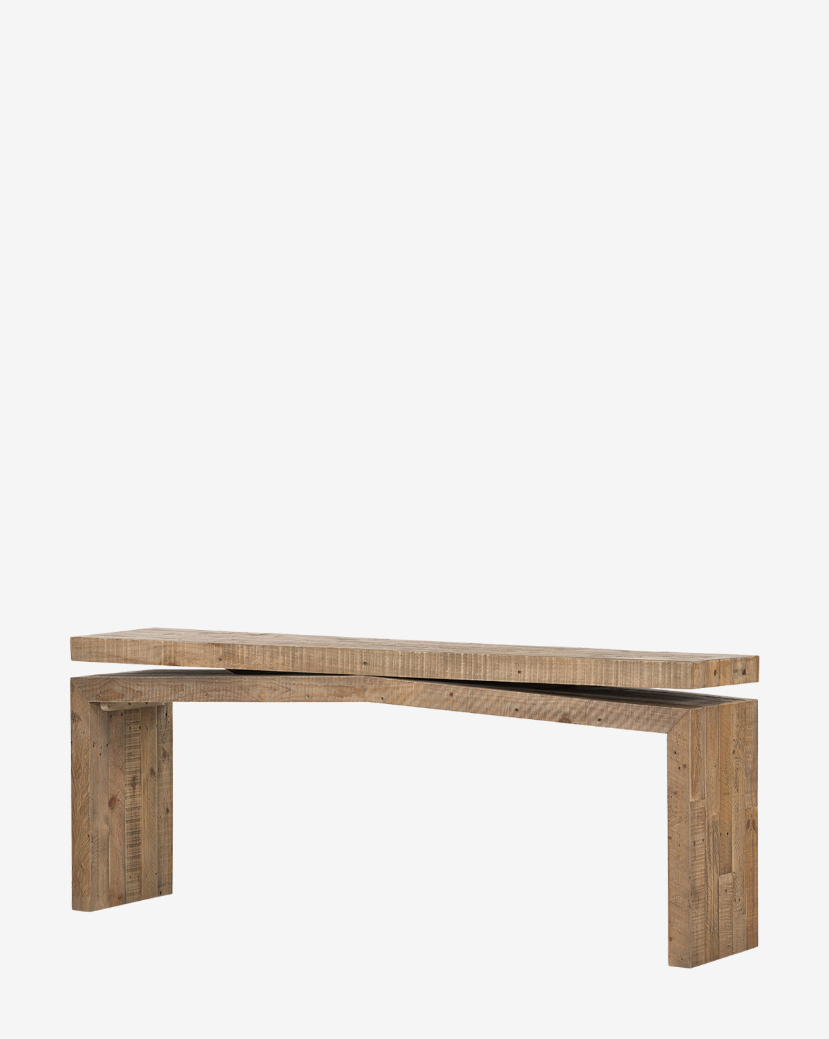 The Colter Console Table is a minimalist wooden piece made from reclaimed wood, featuring an angular, asymmetrical design and a natural finish, shown against a plain white background by McGee & Co.
