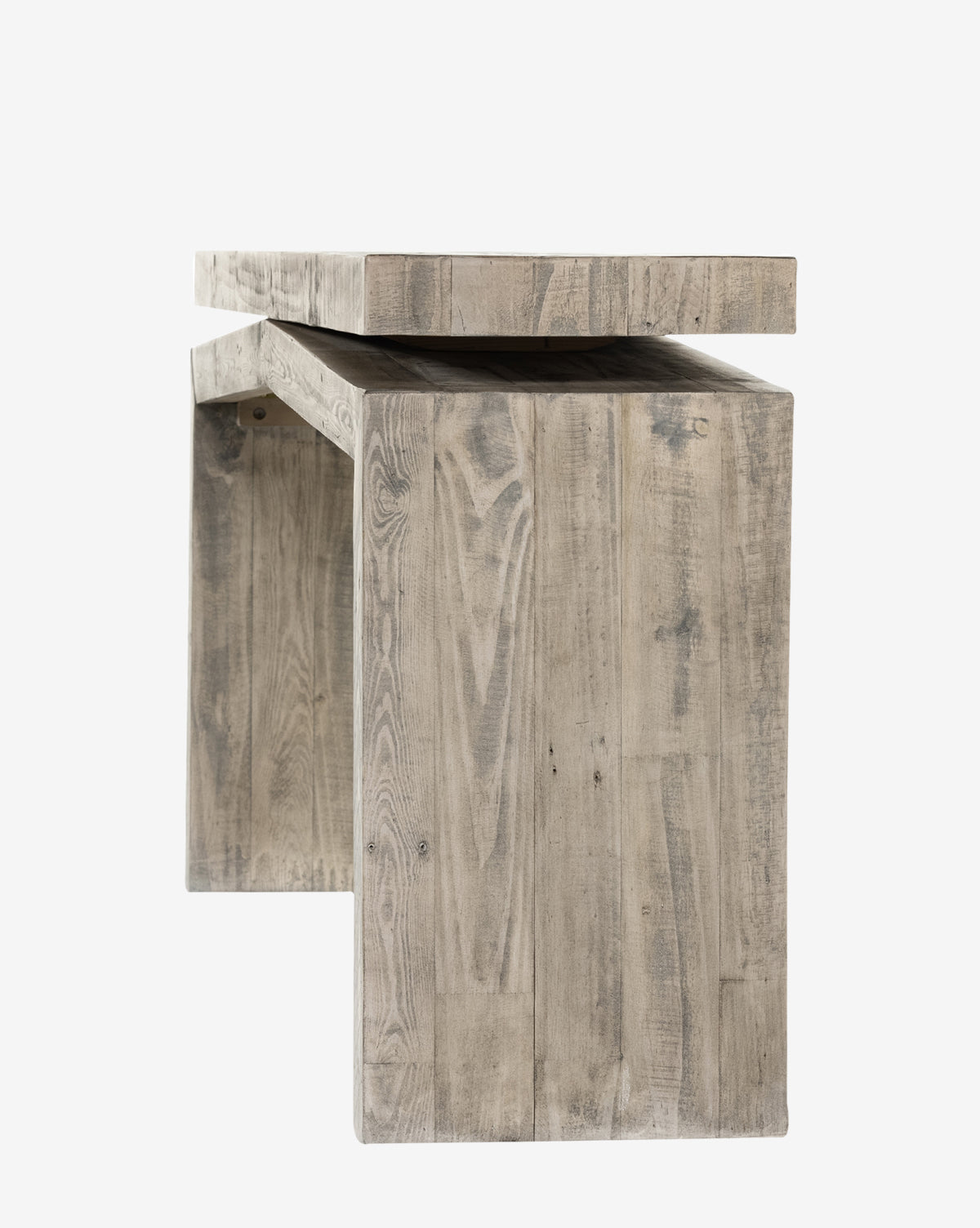 The Colter Console Table features a minimalist design with thick legs and a rectangular seat, crafted from reclaimed wood in a naturally weathered finish—ideal as a modern entryway table. Shown against a white background by McGee & Co.