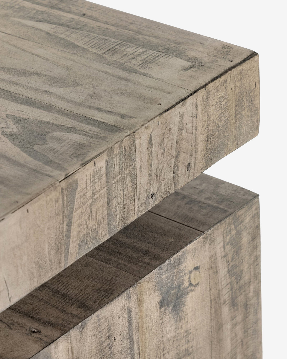 Close-up of the Colter Console Table corner, showcasing the grain, texture, and natural variations in its light, weathered reclaimed wood—ideal for a modern entryway, by McGee & Co.