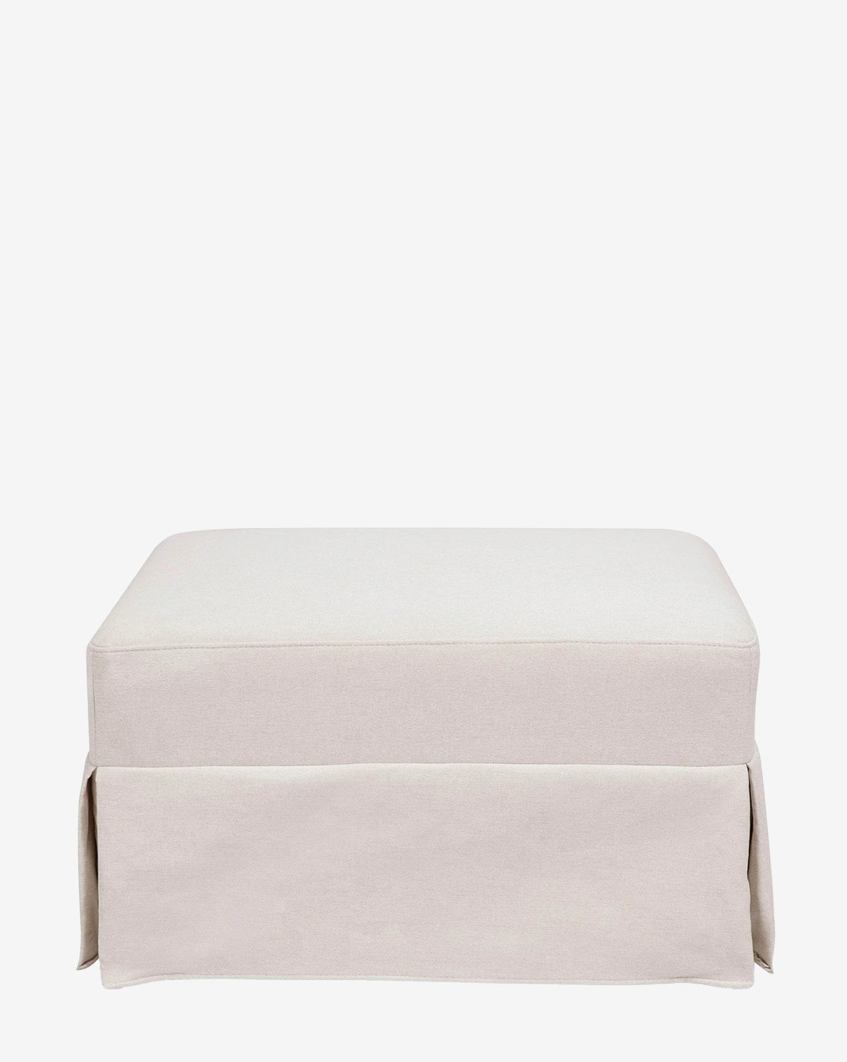 The Crawford Gliding Ottoman by Million Dollar Baby features a rectangular, light beige silhouette with a tailored skirt and minimalist eco-performance upholstery—ideal as a versatile nursery ottoman by McGee & Co.