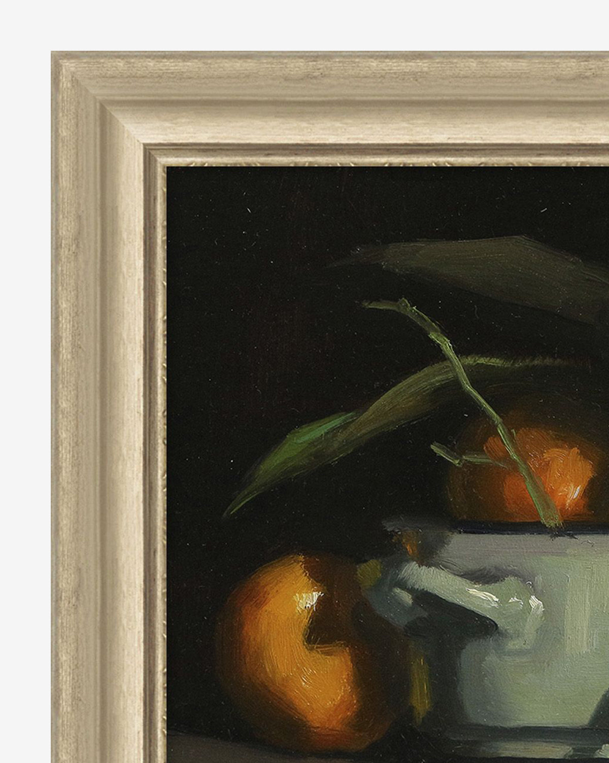 A close-up of the Oranges Still Life shows a white bowl with two oranges—one inside with green leaves, one outside—on a dark background, making it the perfect canvas wall art for your space.