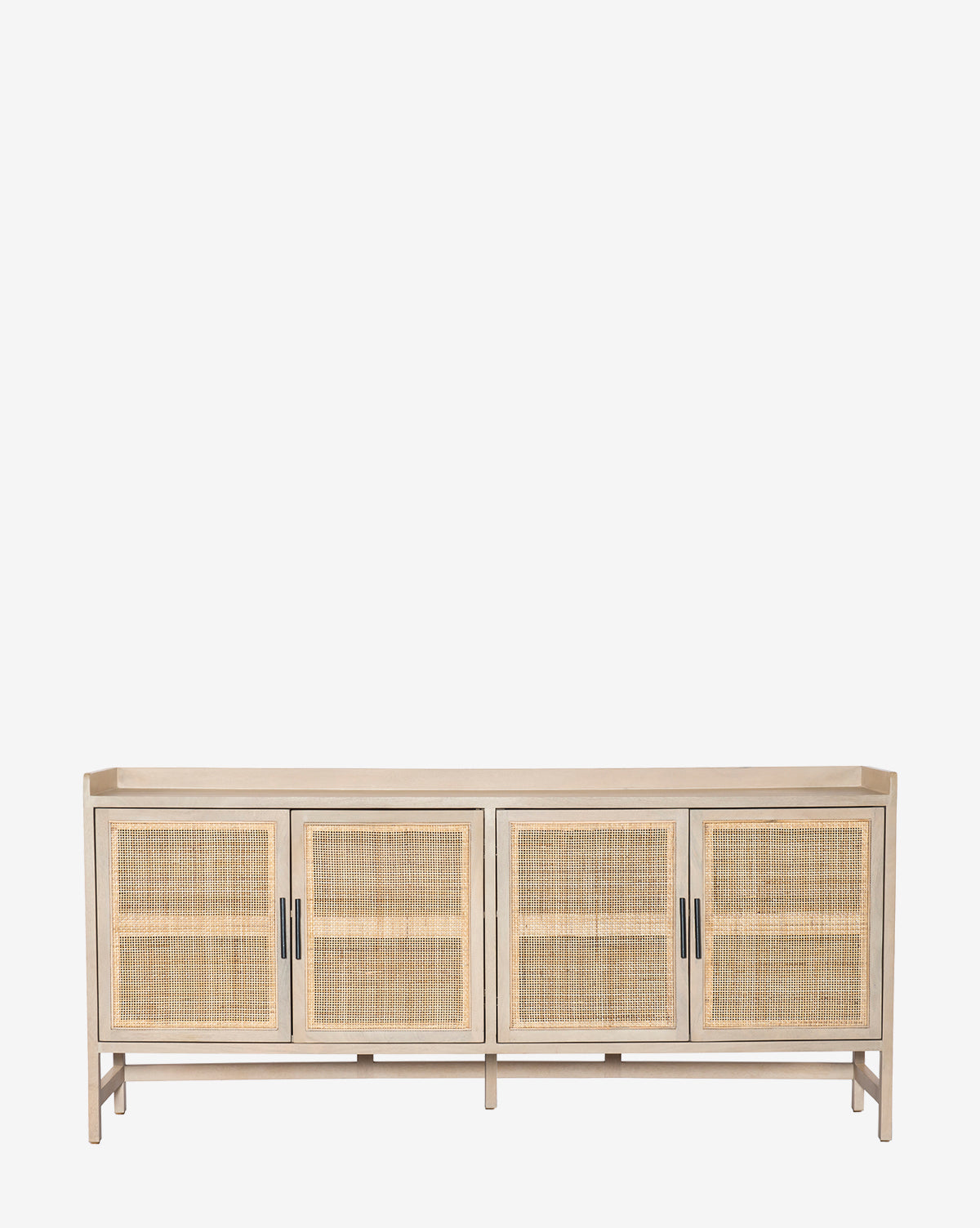 The Dahlia Sideboard features light mango wood, four doors with woven rattan panels, and black handles for a touch of natural elegance—perfect against any white backdrop, by McGee & Co.