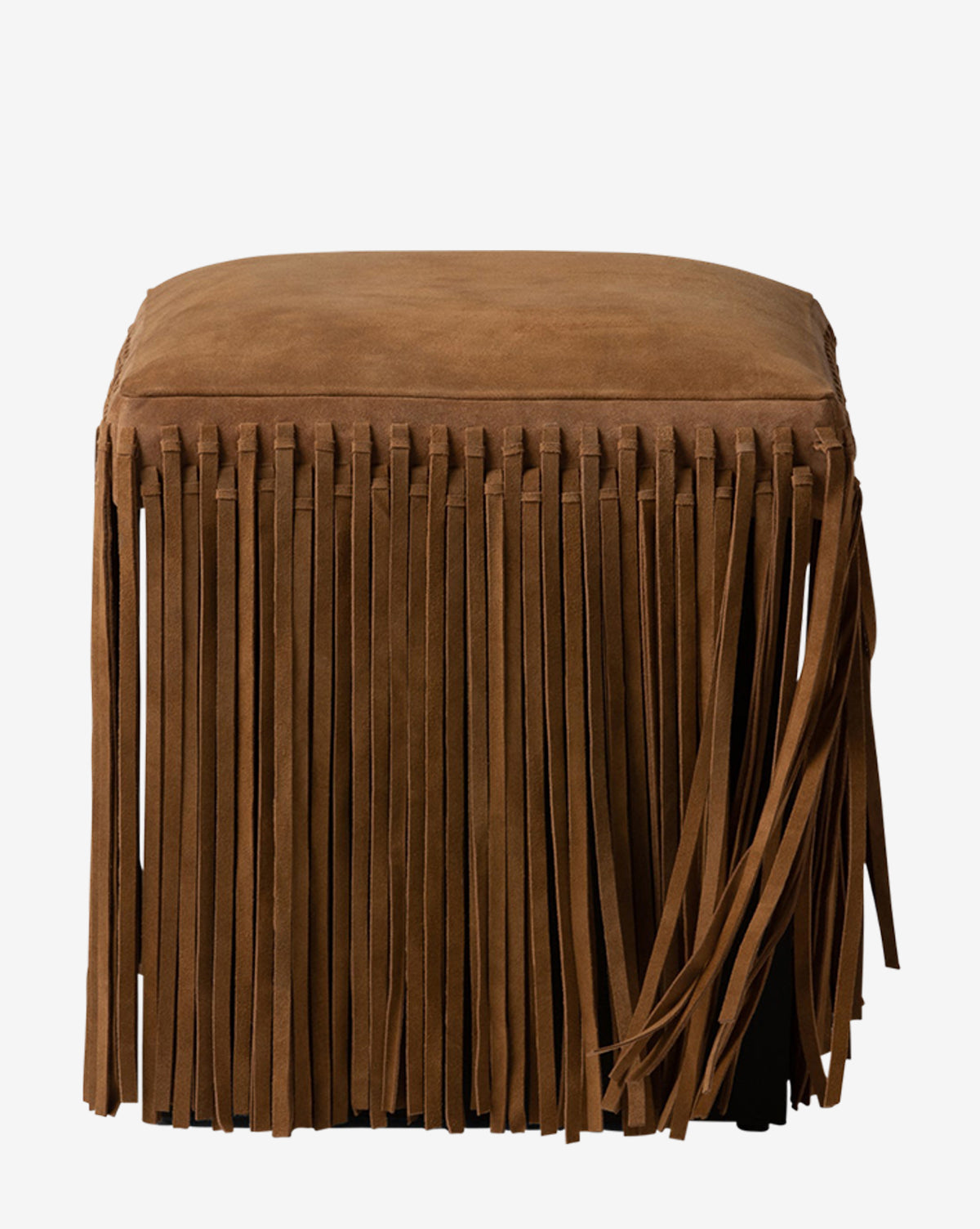 The Damian Ottoman by Made Goods is a square suede ottoman in rich camel with long fringe on all sides for a textured, decorative look, shown against a plain white background. McGee & Co.