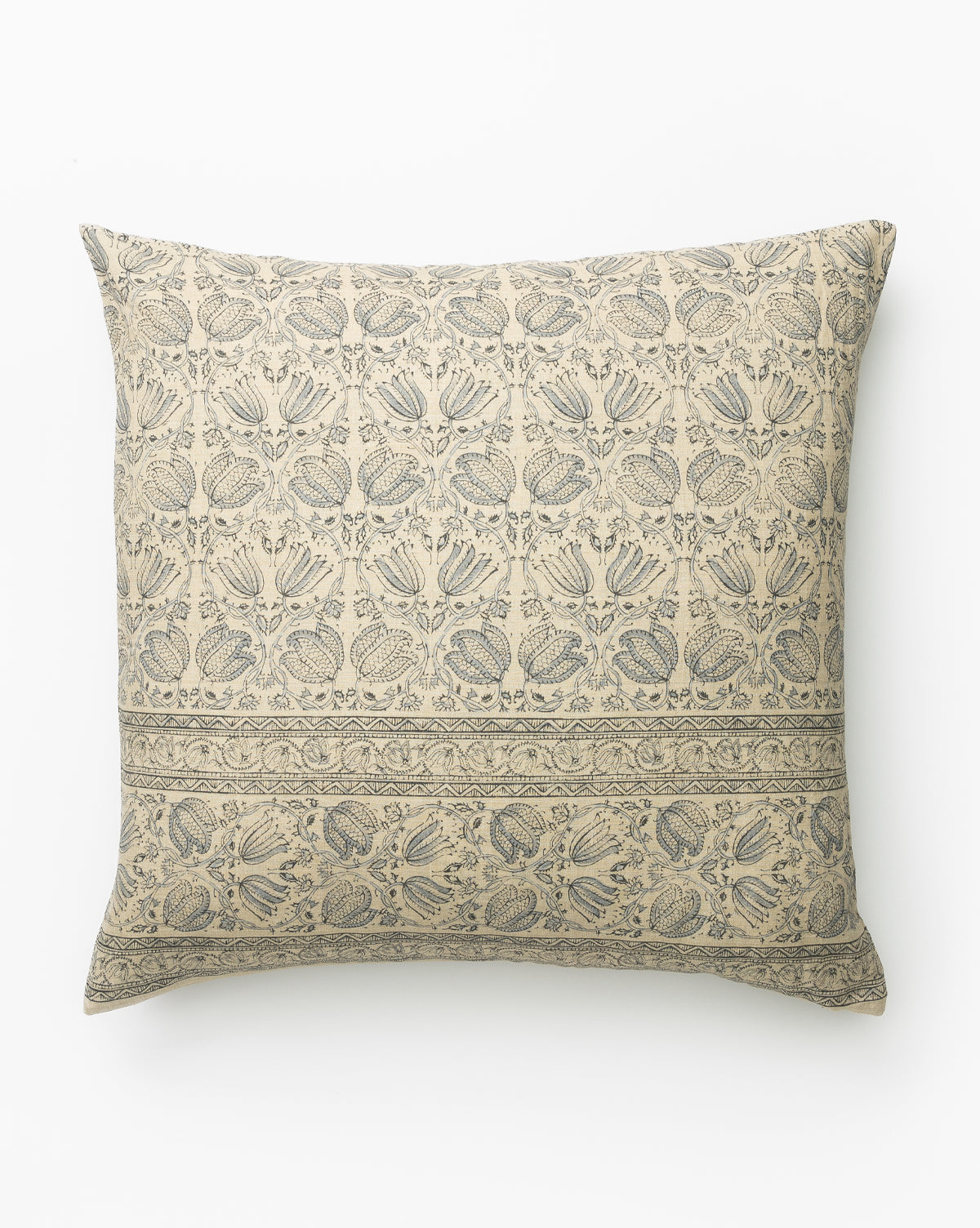 The Danny Floral Print Pillow Cover is a square beige pillow featuring intricate dark blue floral and paisley motifs with a decorative border, all set against a plain white background for an elegant Studio McGee look by McGee & Co.
