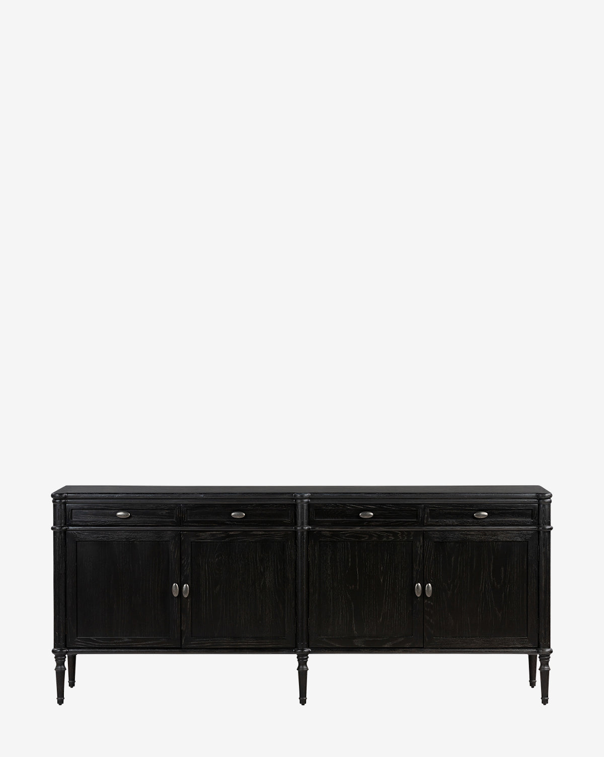 The Dixon Sideboard is a black oak sideboard with four drawers, four cabinet doors, brass hardware, and tapered legs, shown against a plain white background by McGee & Co.