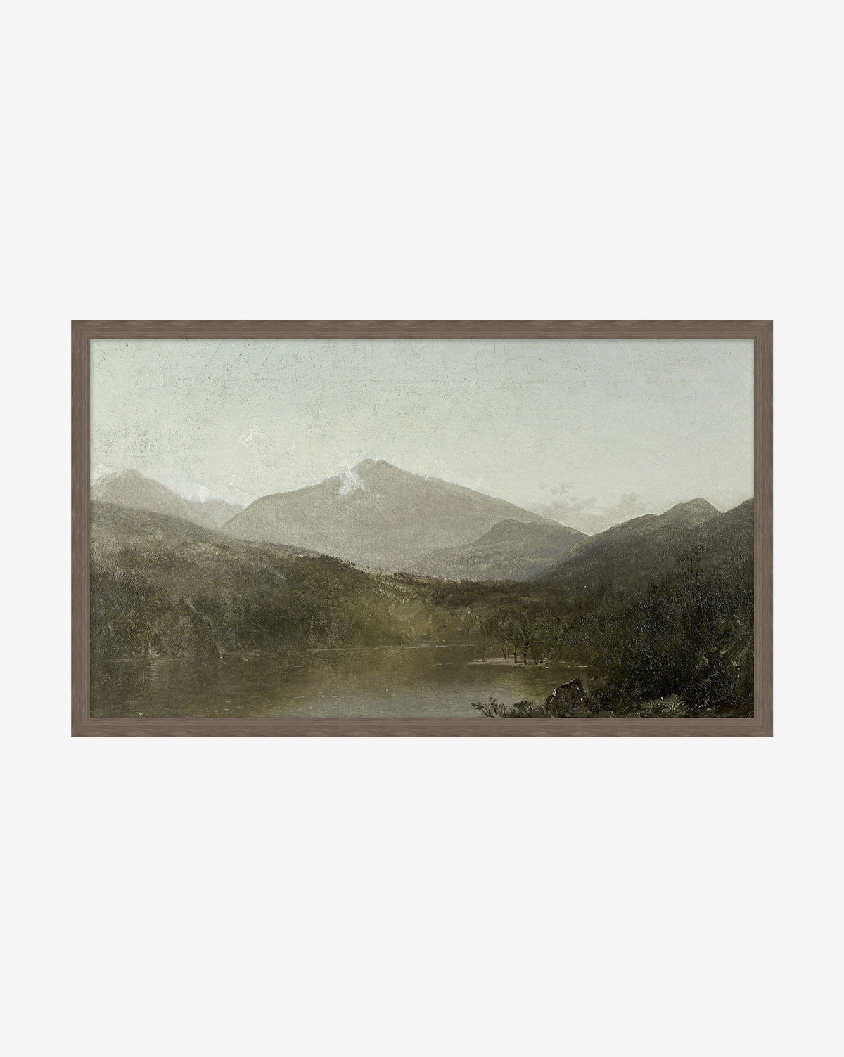 Darsey Lake Peaks is a framed landscape painting with distant mountains, a forested valley, and a calm lake beneath an overcast sky. Muted greens, browns, and soft blues are complemented by a classic walnut wood frame.