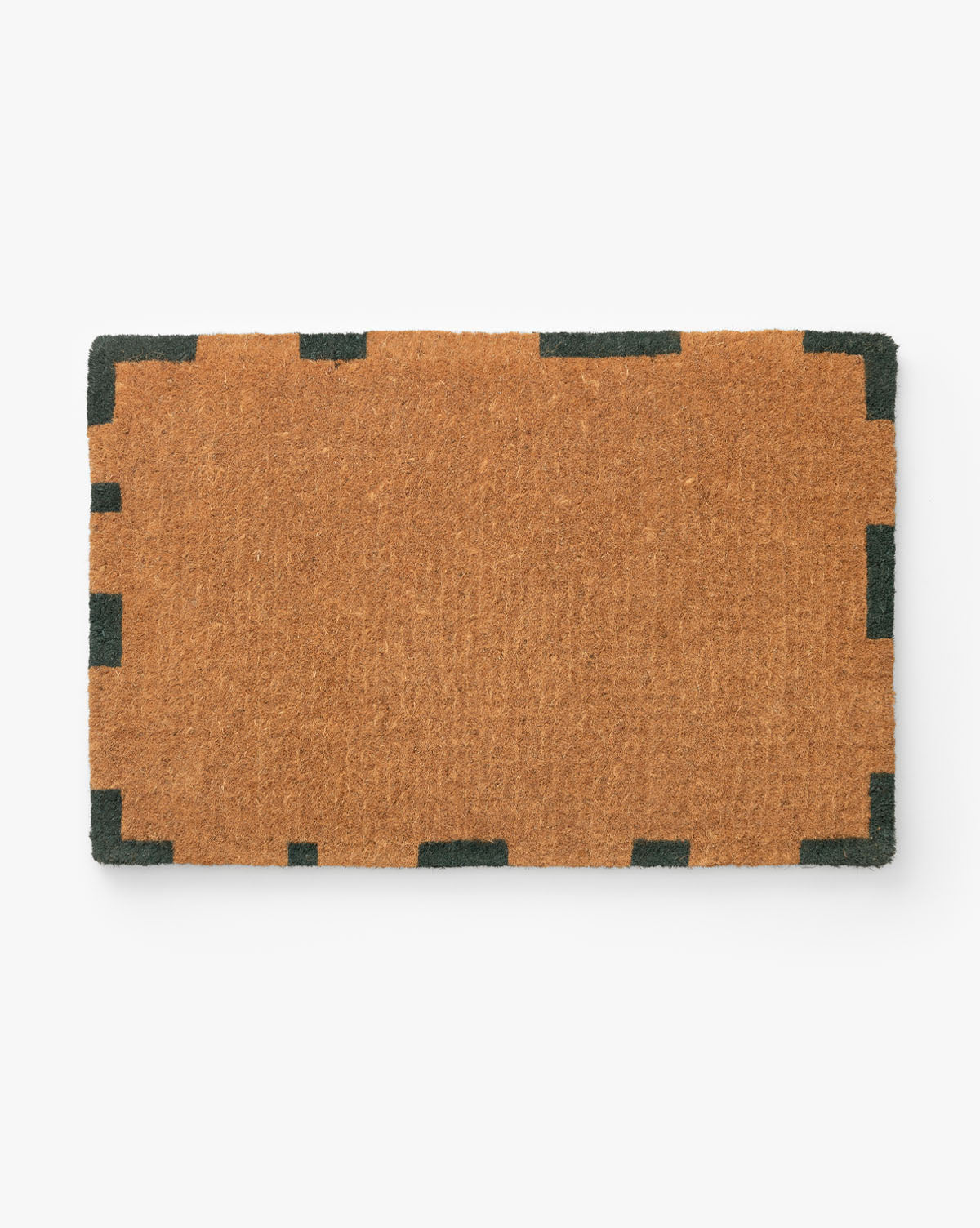 The Dashed Border Doormat is a rectangular brown jute mat with a simple black geometric border, ideal for traditional front doors, shown on a white background by McGee & Co.