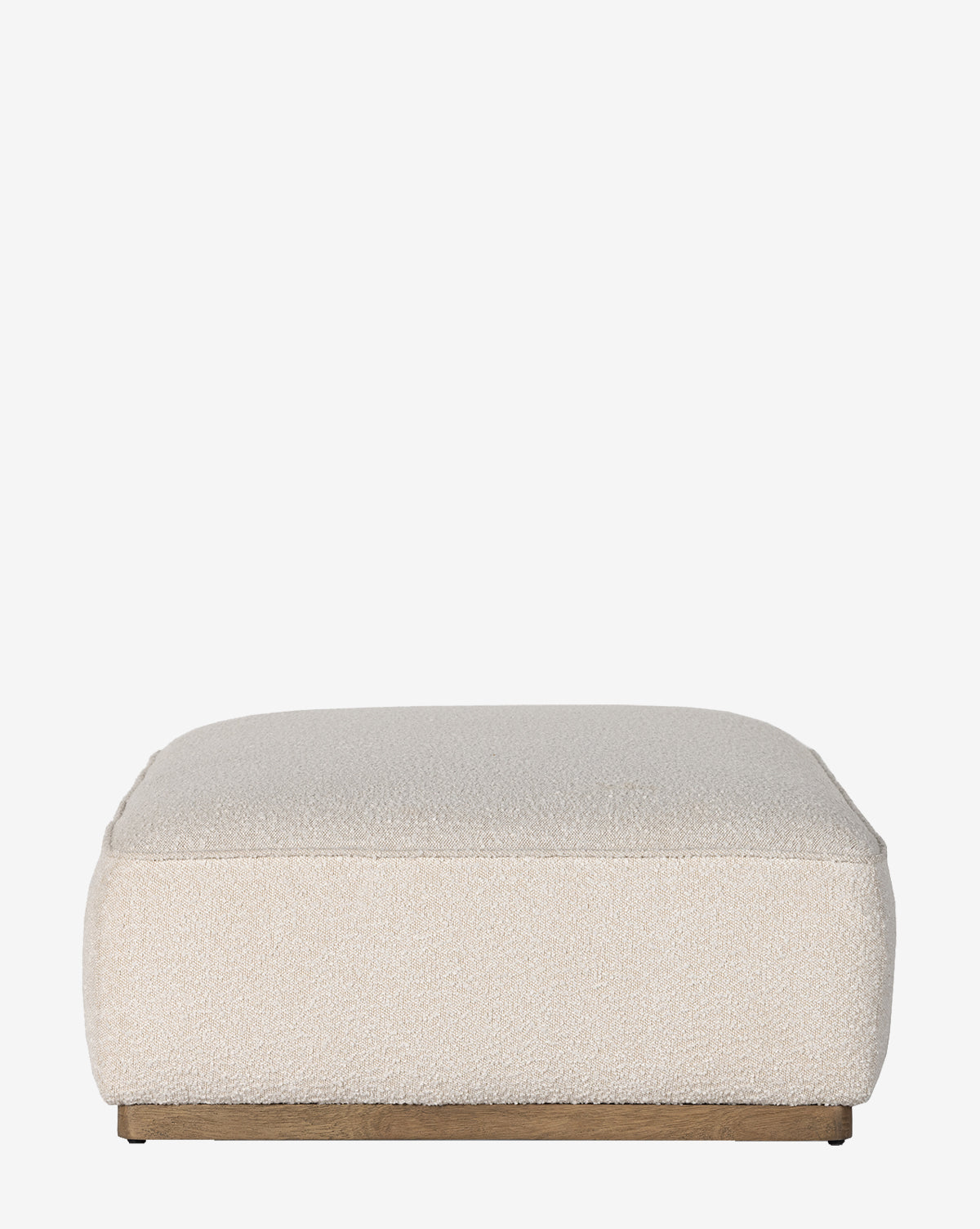 The Dawson Rectangular Ottoman by Four Hands features cream textured performance fabric and a sturdy parawood base, shown here against a plain white background, McGee & Co.