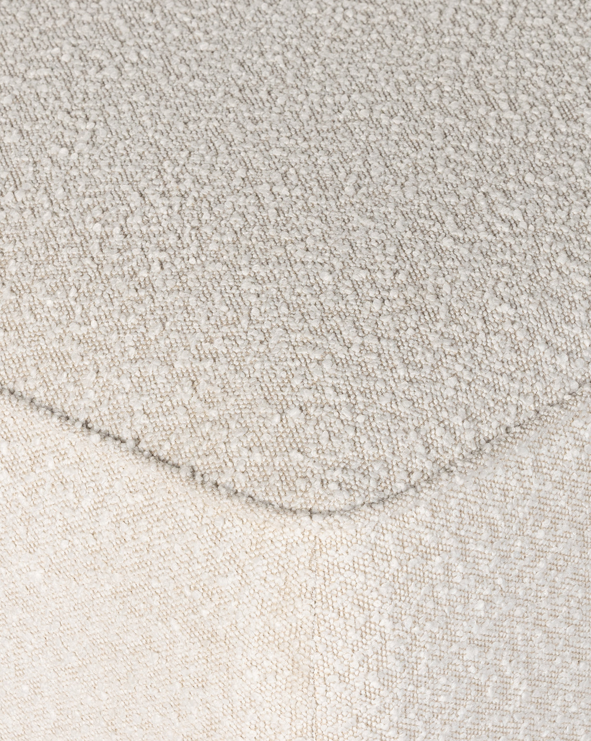 Certainly! Here’s your revised text with the exact string McGee & Co. blended at the end: Close-up of the Dawson Rectangular Ottoman by Four Hands, featuring light beige, textured performance fabric upholstery with visible seams and a soft, slightly nubby surface—McGee & Co.