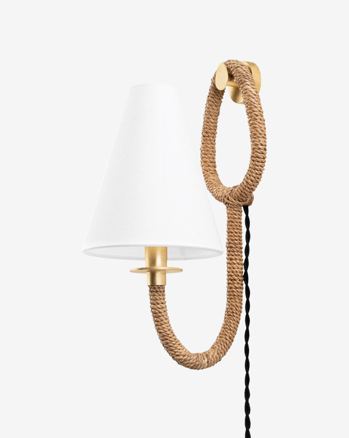 The Deaver Sconce by Troy Lighting features a white conical shade, brass fixture, and a rope-wrapped arm with a loop at the base, completed by a black twisted cord for a modern coastal look using natural materials—finished with the signature touch of McGee & Co.