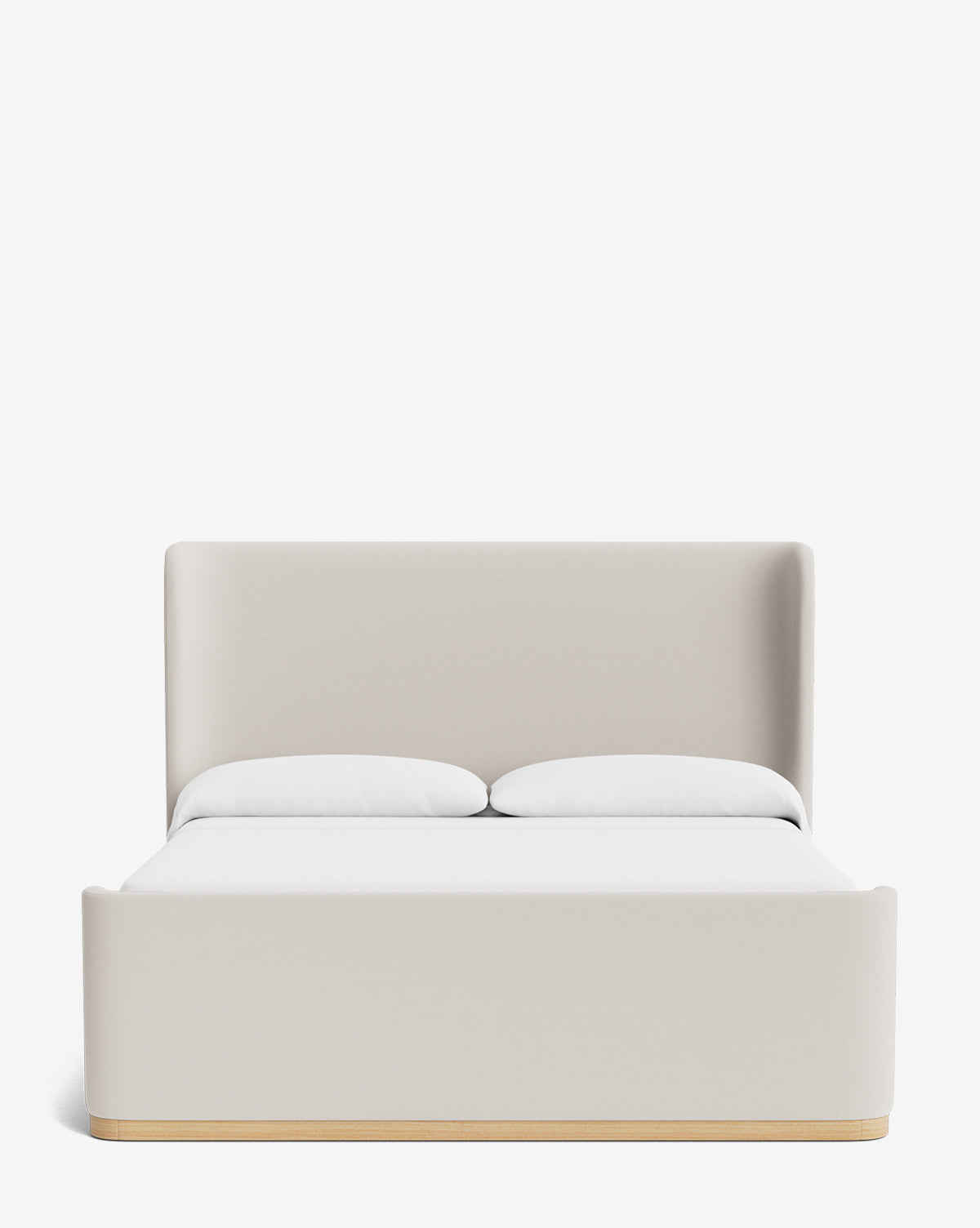 The Makerspalm test Denning Upholstered Bed features a high, padded beige headboard crafted from premium upholstery, with two white pillows, shown from the front against a plain white background. McGee & Co.