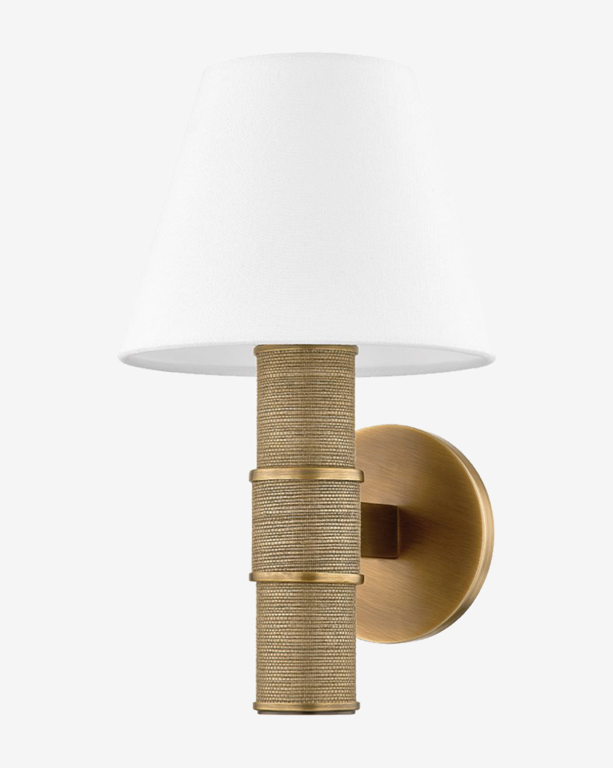 The Denton Sconce by Troy Lighting features a round brass base, a textured rope-wrapped cylindrical stem, and a white conical fabric shade for modern coastal style. McGee & Co.
