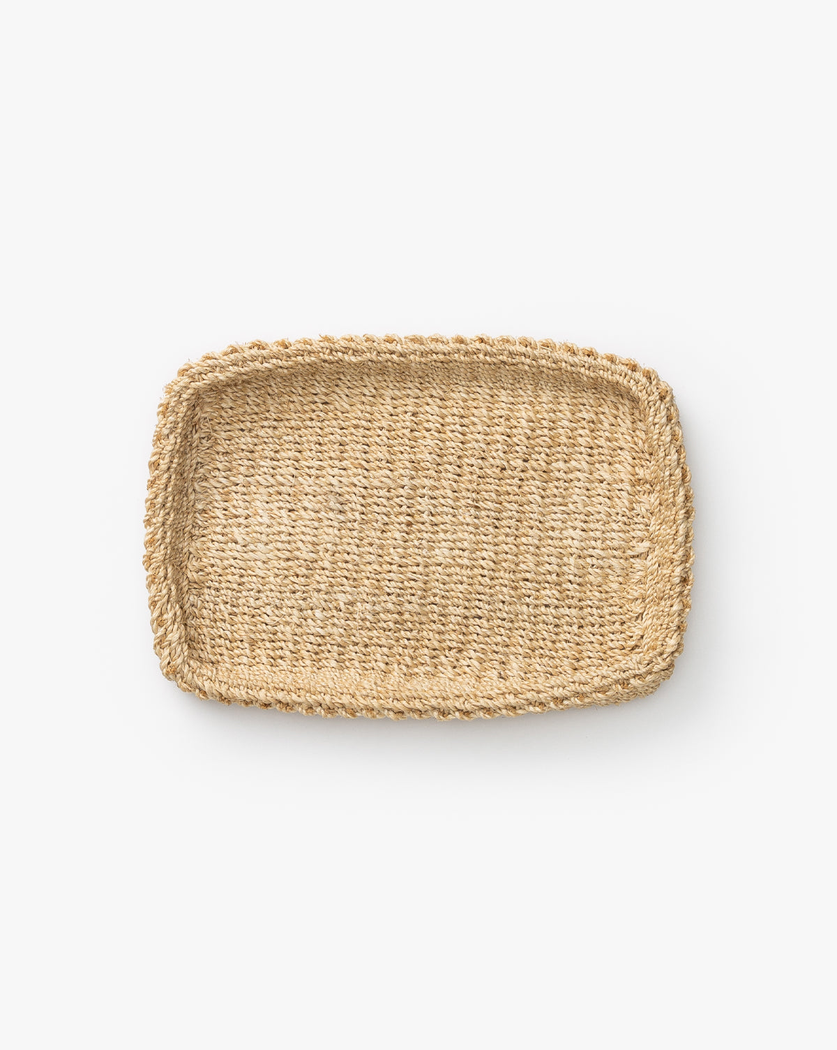 The Deryn Woven Tray, crafted from natural straw fibers, is ideal for coffee tables or organizing essentials. Shown from above on a plain white background.