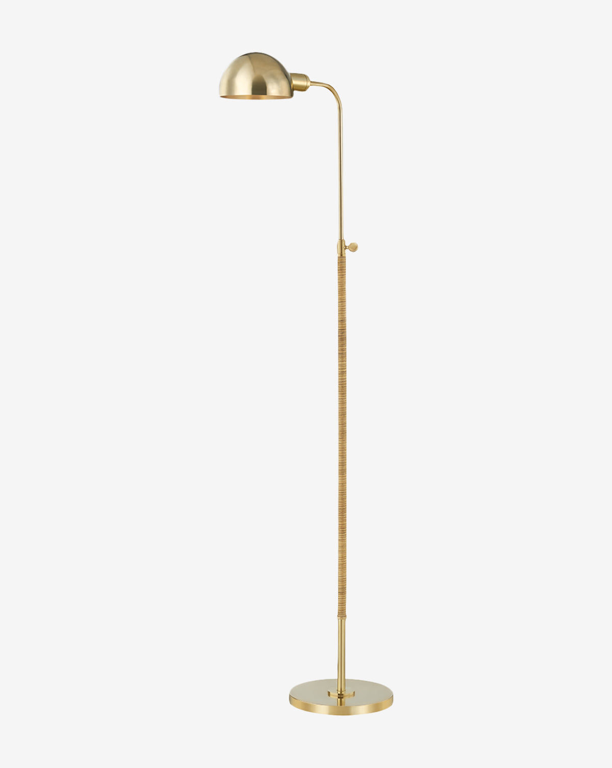 The Devon Floor Lamp by Hudson Valley Lighting features a dome-shaped shade, slender adjustable stem, and round base with a minimalist gold finish—an elegant upgrade from the classic rattan floor lamp. McGee & Co.