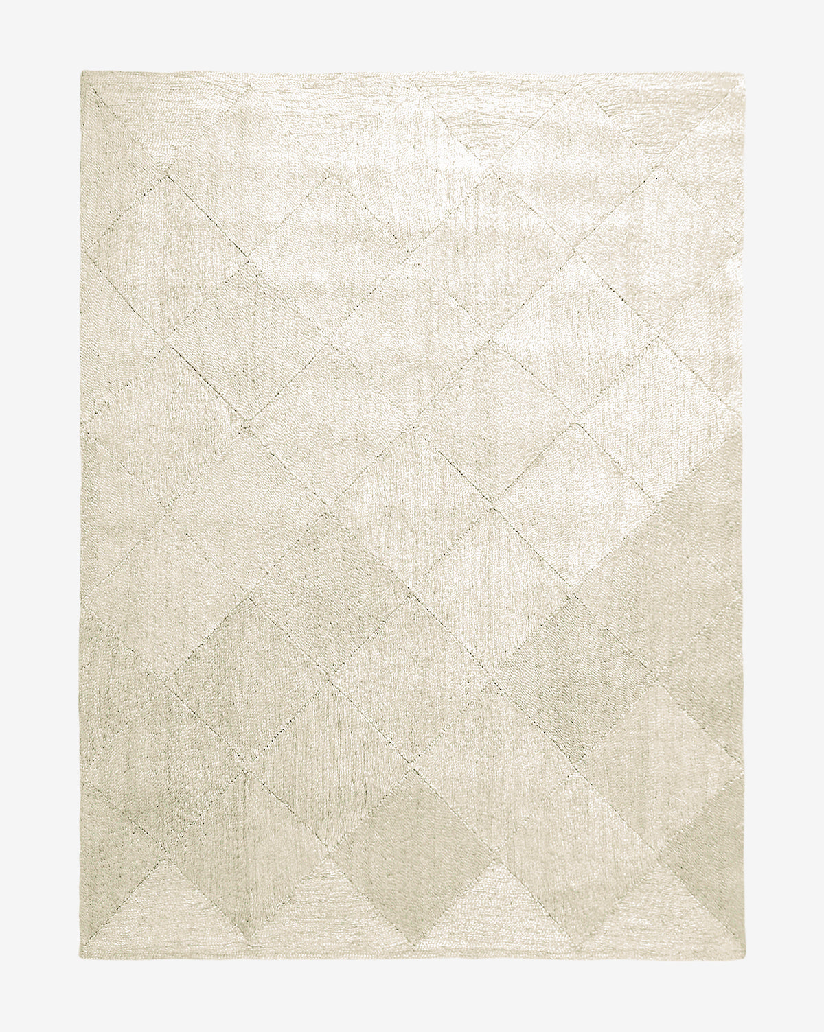 The Diamond Braided Bleached Jute Rug is a hand-woven rectangular rug featuring a subtle geometric diamond pattern in beige and cream tones on a light background, showcasing minimalist, modern style and organic beauty by McGee & Co.