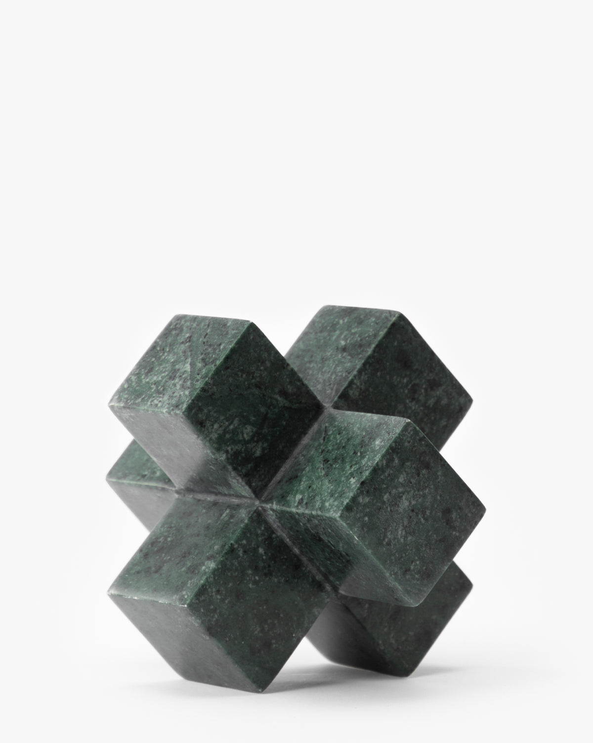 The Diani Marble Cuboid Object is a dark green geometric sculpture crafted from marble, featuring intersecting cubes in a symmetrical 3D cross shape—perfect as sculptural decor against a plain white background.