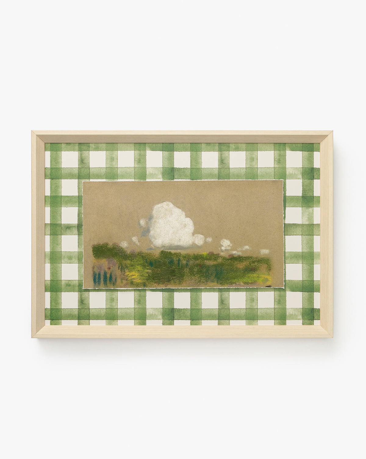 Dreamscape is a framed giclee print with a green and white checkered border, showcasing fluffy white clouds over a green landscape on a tan background—an ideal choice for stylish home decor, by McGee & Co.