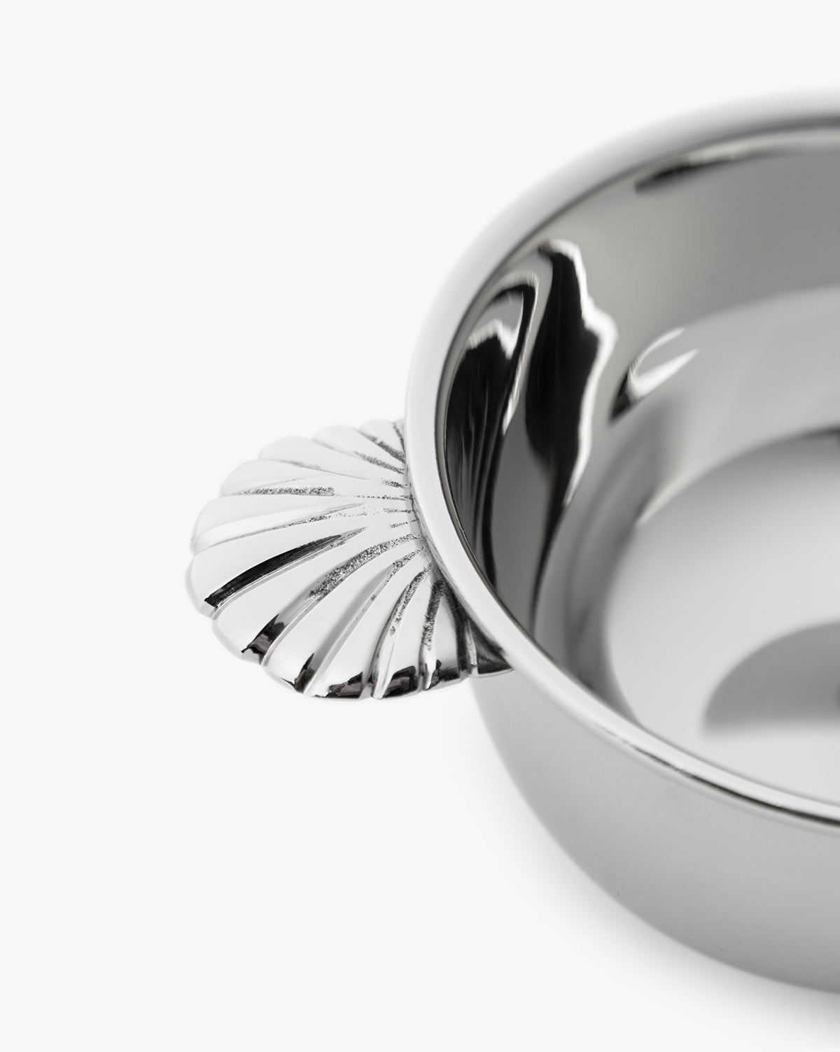 A close-up of the Durham Condiment Bowl with ornate handles and a decorative shell-shaped accent, displayed on a white background, by McGee & Co.