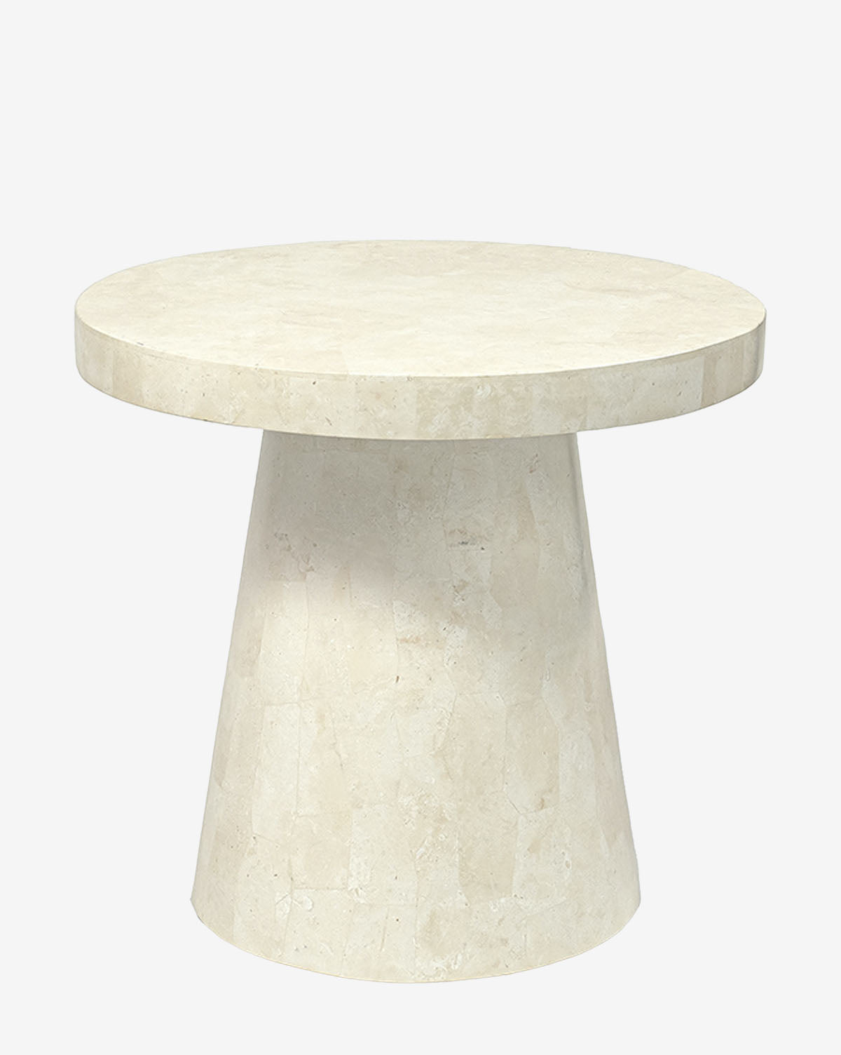 The Effie Outdoor Side Table is a round, modern piece crafted from light beige stone with a thick top and wide tapered base, shown against a plain white background by McGee & Co.