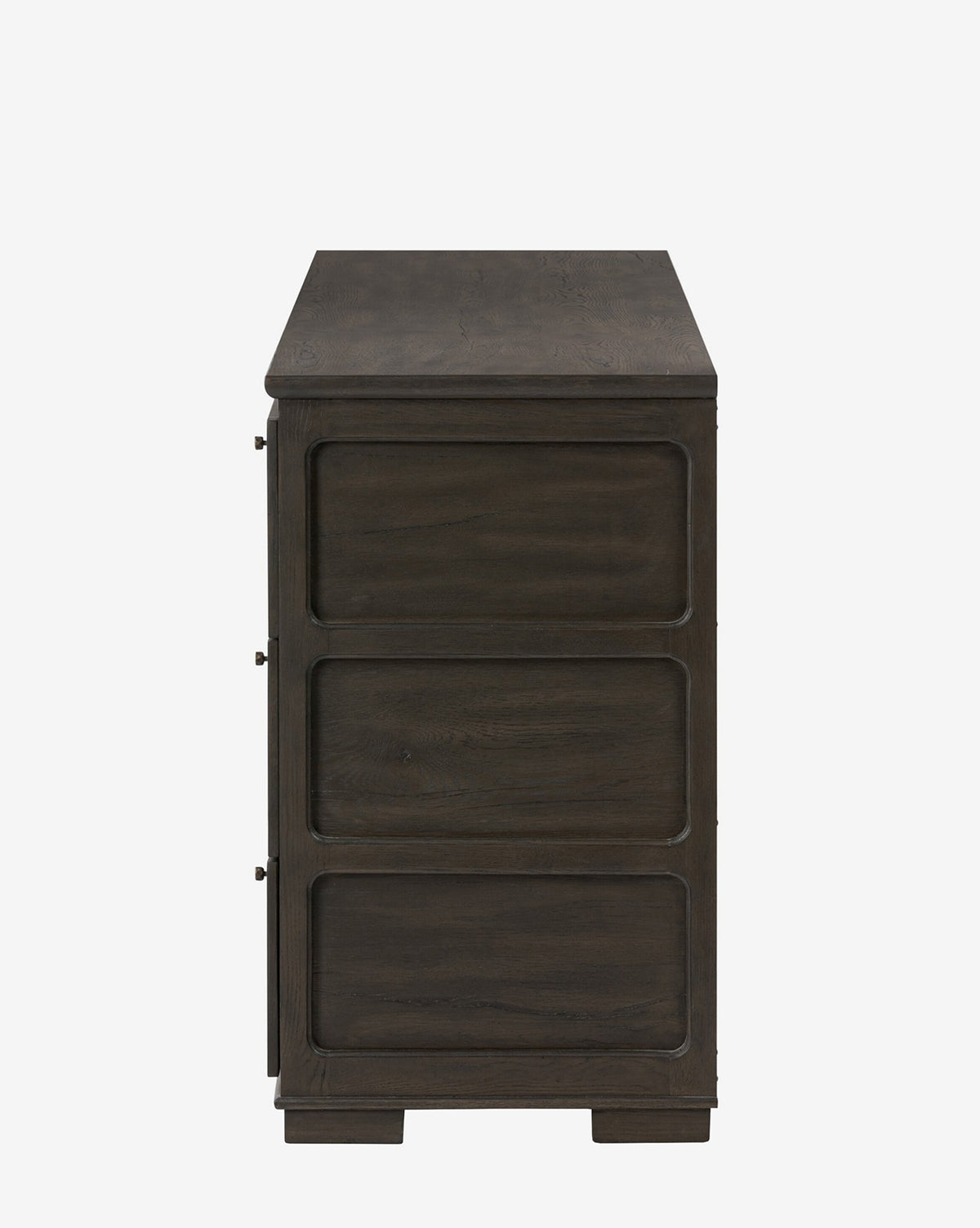 Side view of the Eldoria Oak Sideboard in black oak, showcasing three rectangular panels and clean, handle-free lines against a white background for a modern, minimalist look, by McGee & Co.