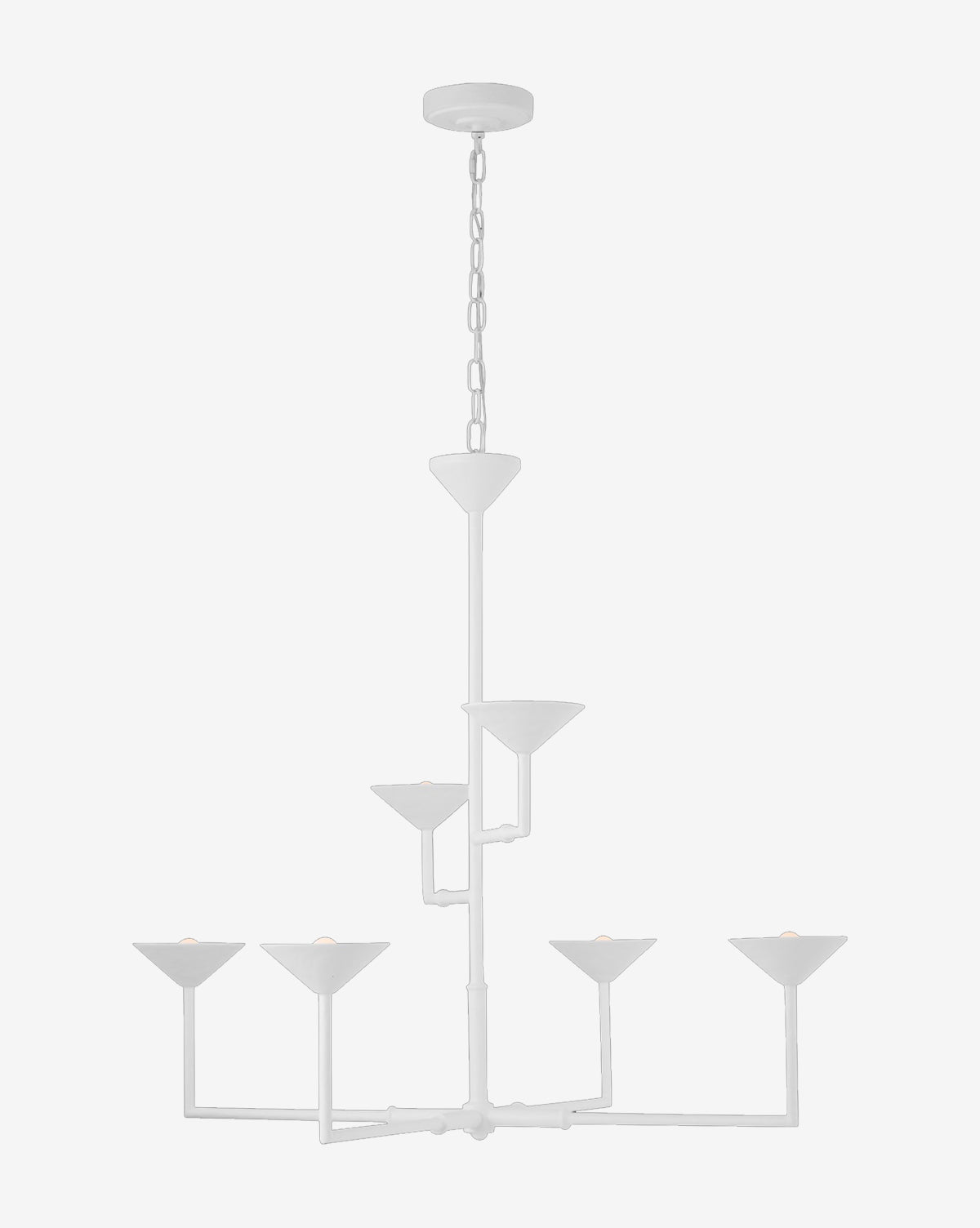 The Eleanor Chandelier by Visual Comfort & Co. Signature is a modern white plaster fixture with six upward-facing cone shades at varying heights, suspended by a chain for a striking geometric look. McGee & Co.