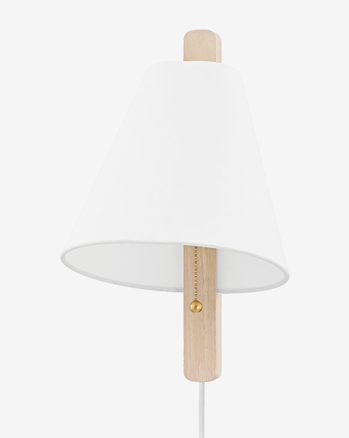 The Ellen Plug-In Sconce by Hudson Valley Lighting features a white conical linen shade, a light wood vertical base, a brass accent, and a visible white cord for sleek modern style. McGee & Co.