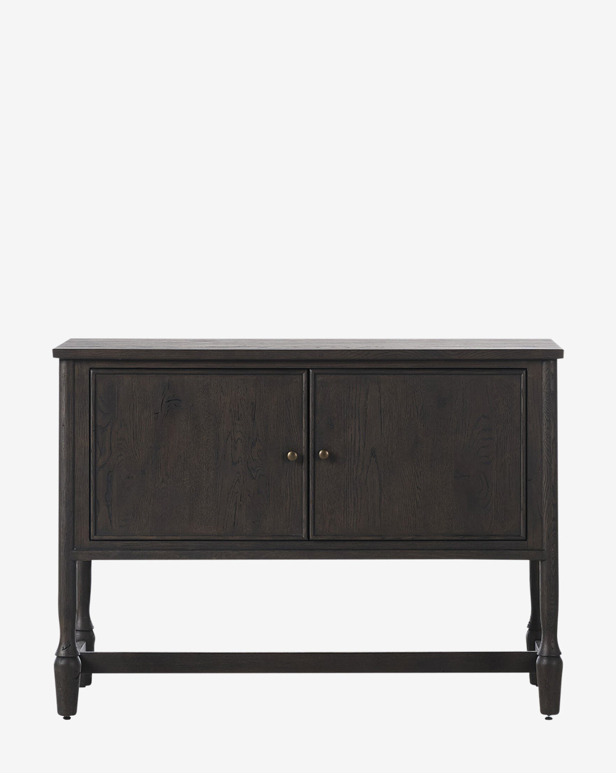 The Elmer Sideboard is a modern dark wood piece with two cabinet doors, round brass knobs, clean lines, and slightly curved legs, displayed against a plain white background by McGee & Co.