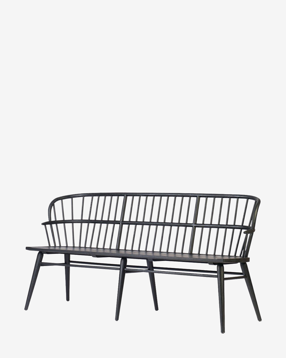 The Elysia Bench is a black wooden bench with a high, curved spindle backrest and armrests, featuring a solid ash frame for a modern, minimalist look, shown against a plain white background by McGee & Co.