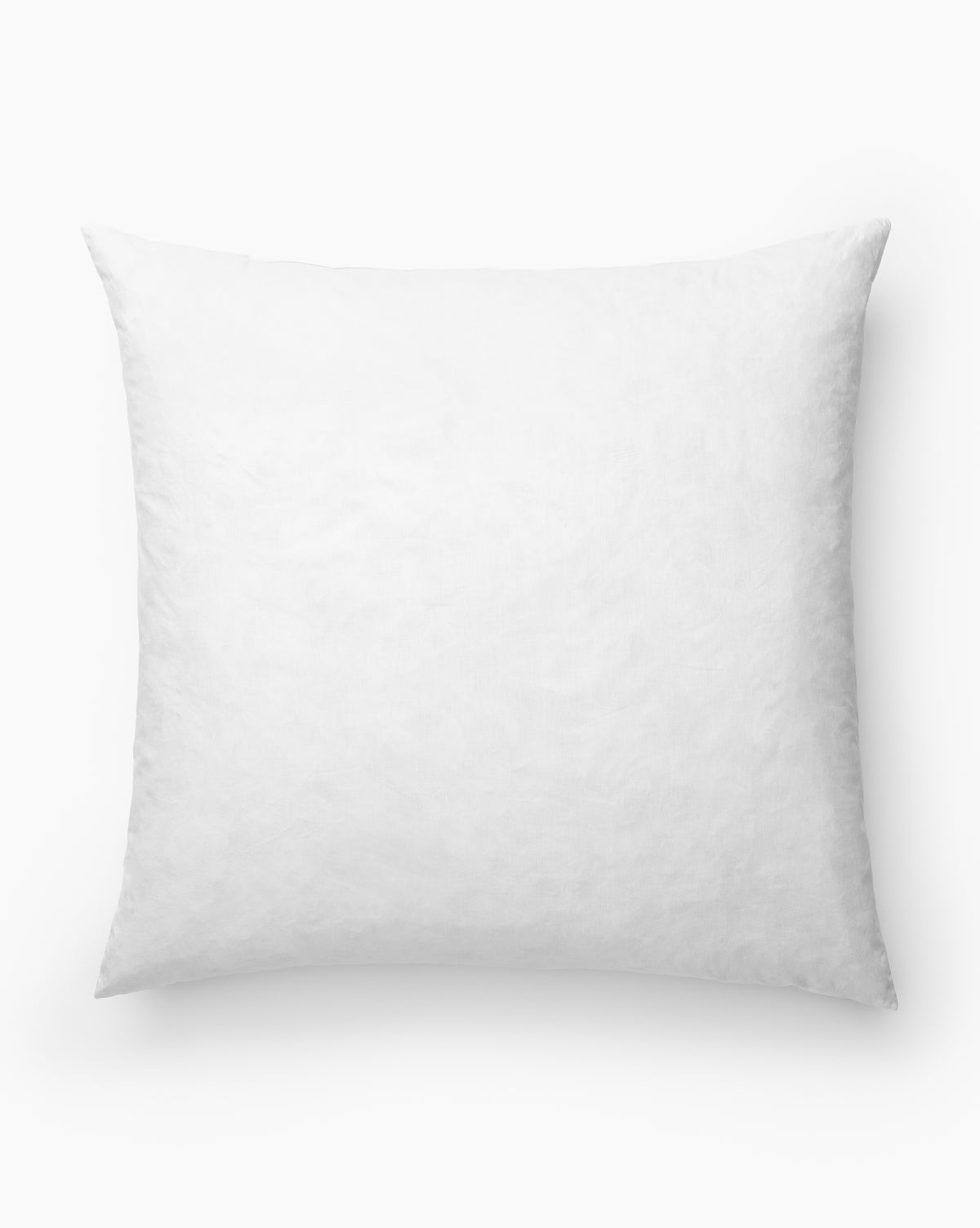 The Euro Pillow Insert is shown in white with a smooth, plush surface against a white background. This square-shaped cotton pillow insert offers added comfort and is perfect for enhancing your home décor, by McGee & Co.