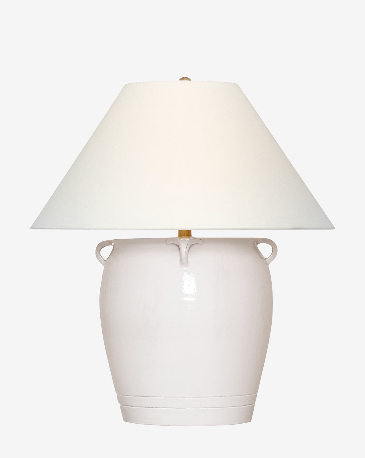 The Fasano Table Lamp by Visual Comfort & Co. Signature has a wide, rounded ceramic base with two side handles and a large white linen shade, offering an elegant look against a plain white background—McGee & Co.
