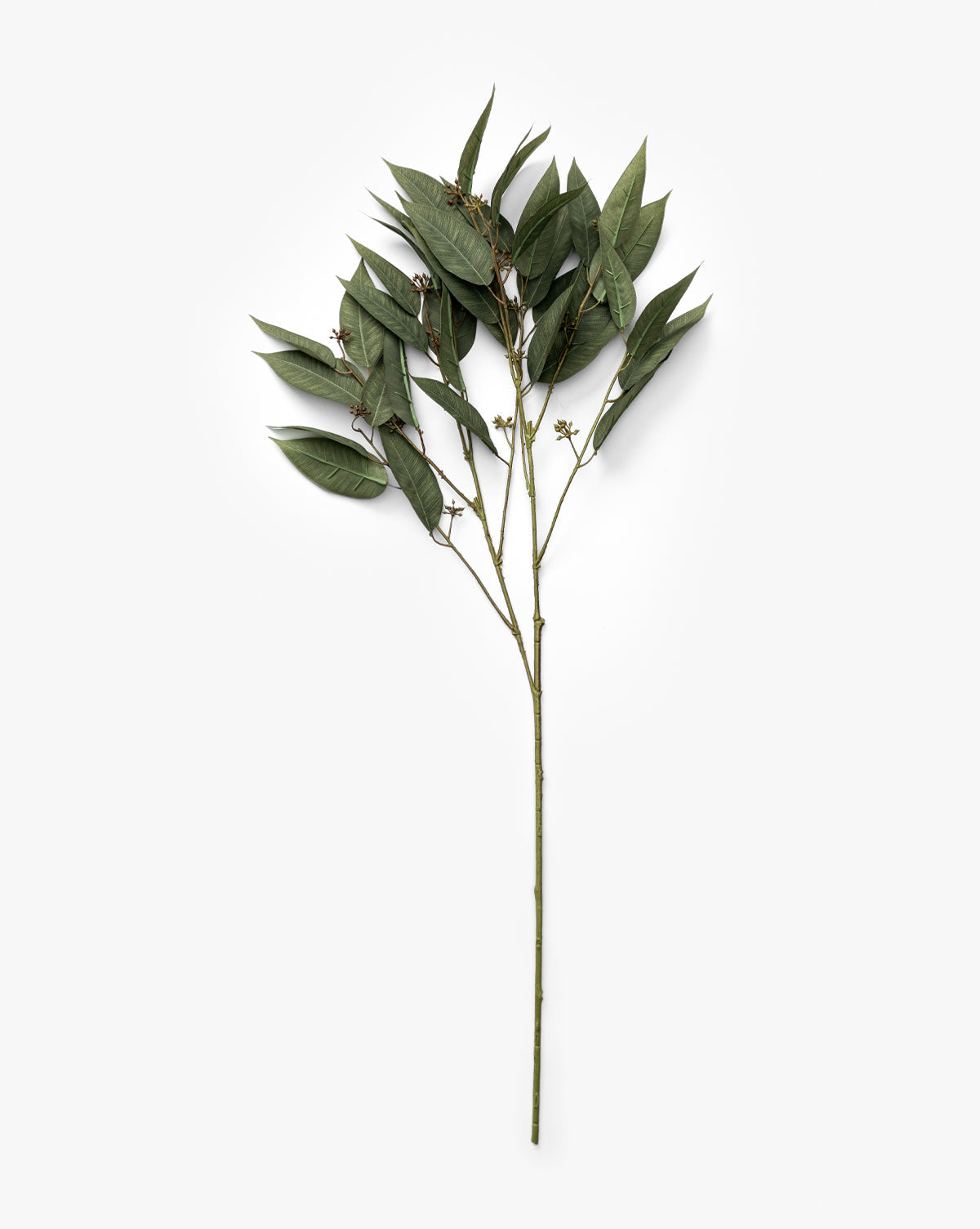 The Faux Eucalyptus Seed Stem features multiple branches with elongated dark green leaves and small brown buds, displayed against a plain white background.